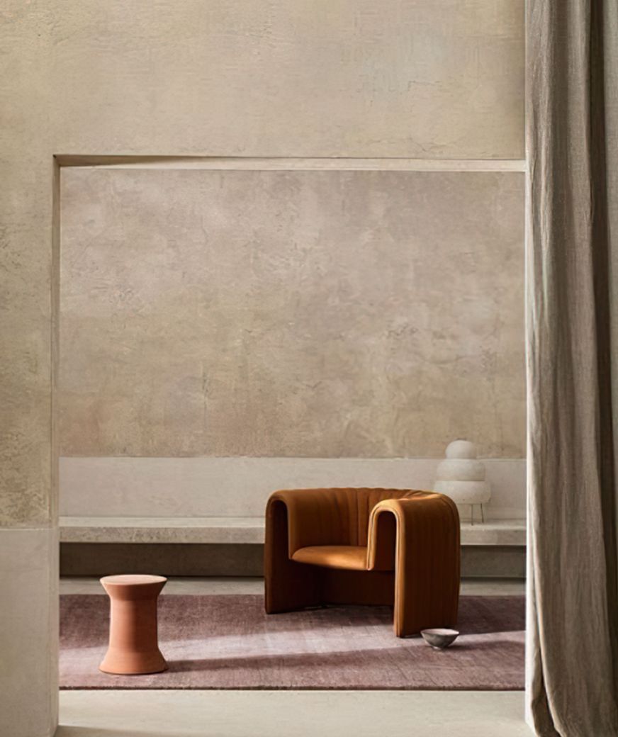 Image Credit: Armadillo | Warm neutral walls in venetian plaster + organic furniture forms