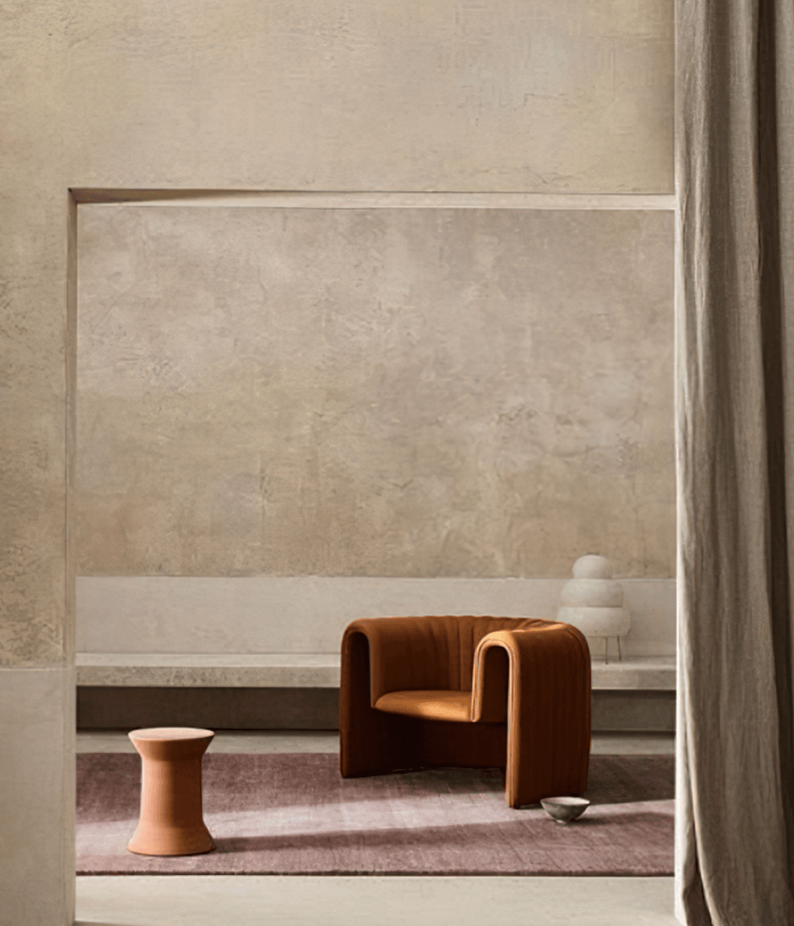 Image Credit:  Armadillo | Warm neutral walls in venetian plaster + organic furniture forms