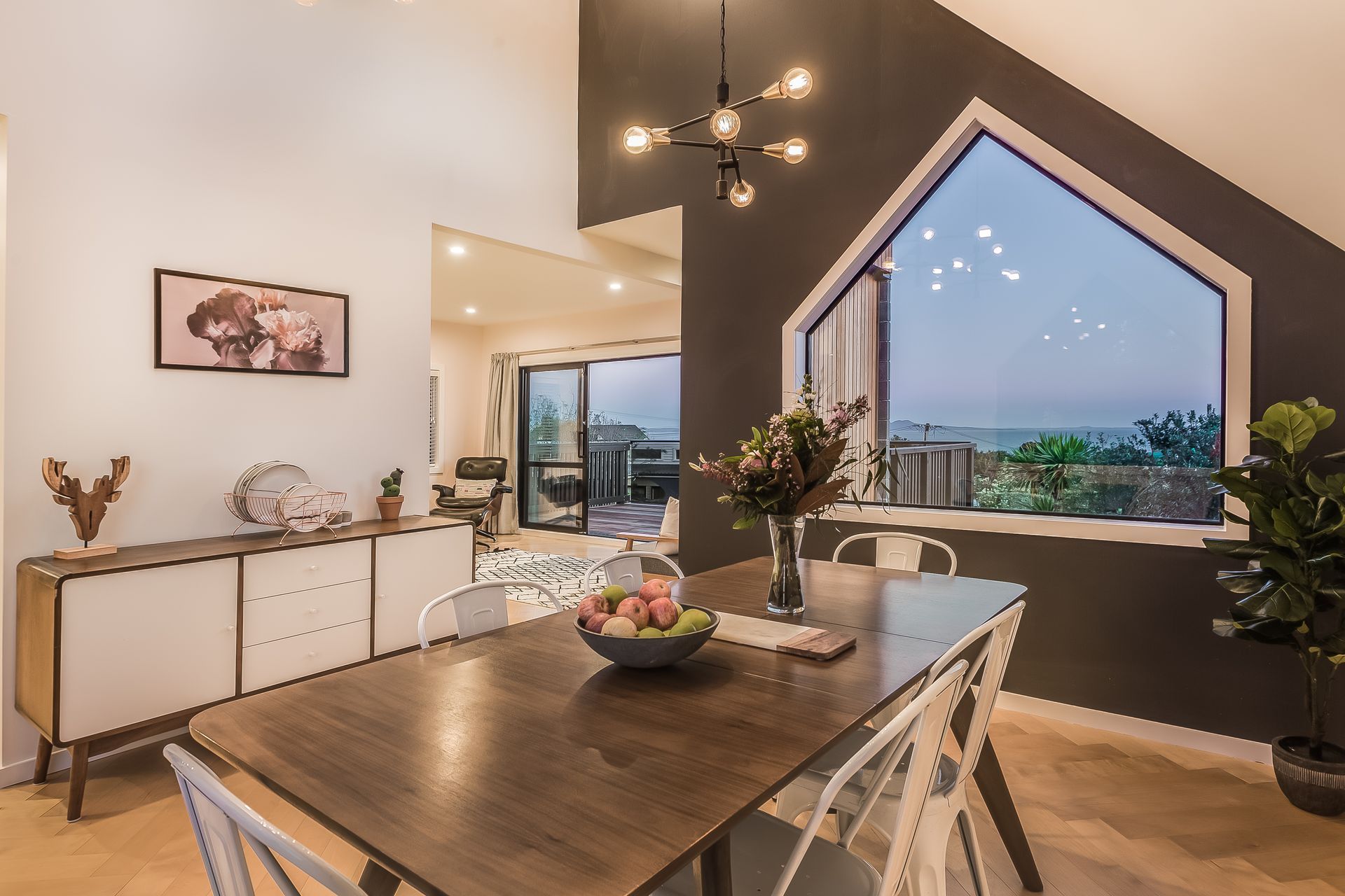 Black and white throughout the house makes a bold statement. “The white looks clean and simple then the contrast lets a feature be a feature.”