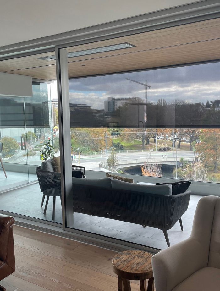 Cafe Blinds are a versatile solution for sun and breeze control. Robust and made without side rails it anchors in place with carabiners. Here it is shown with a strong bottom rail.