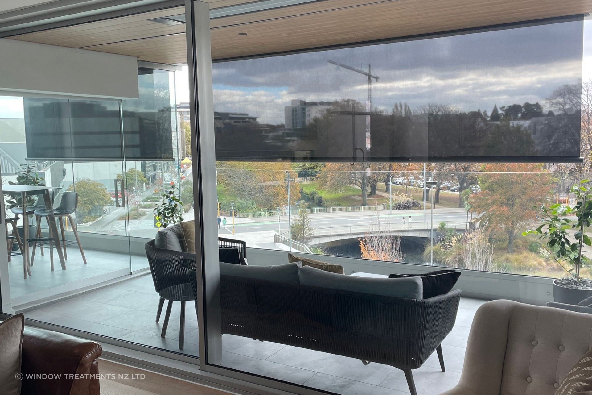 Cafe Blinds are a versatile solution for sun and breeze control. Robust and made without side rails it anchors in place with carabiners. Here it is shown with a strong bottom rail.