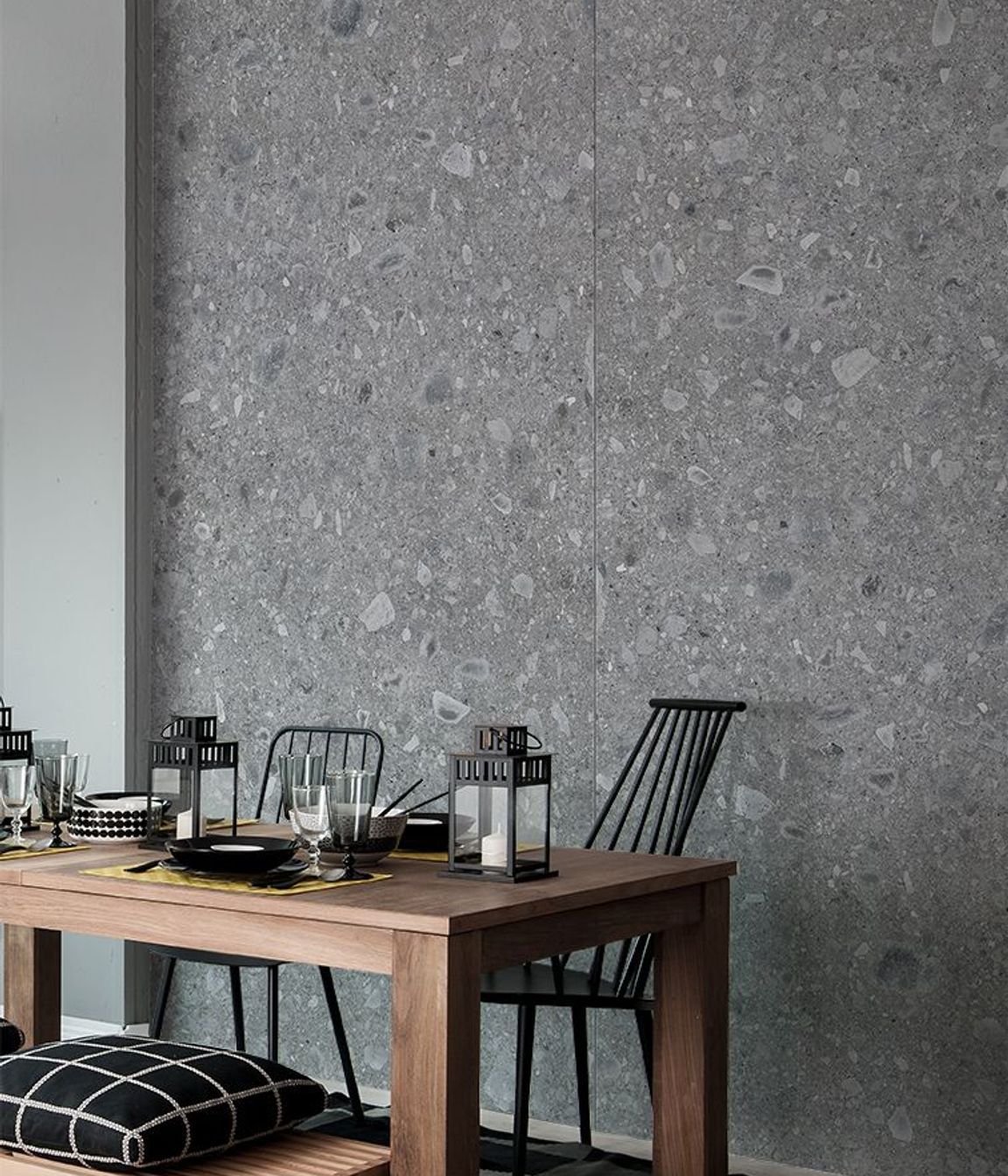 A grey porcelain tile wall with unique patterns.