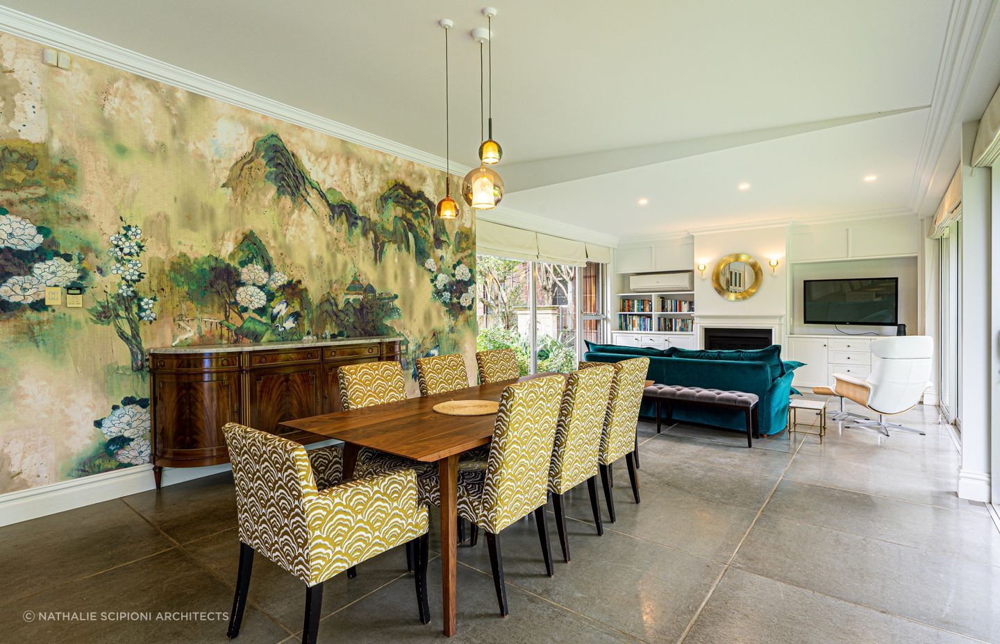 A medium to large sized dining room can easily fit a table that accommodates plenty of diners.