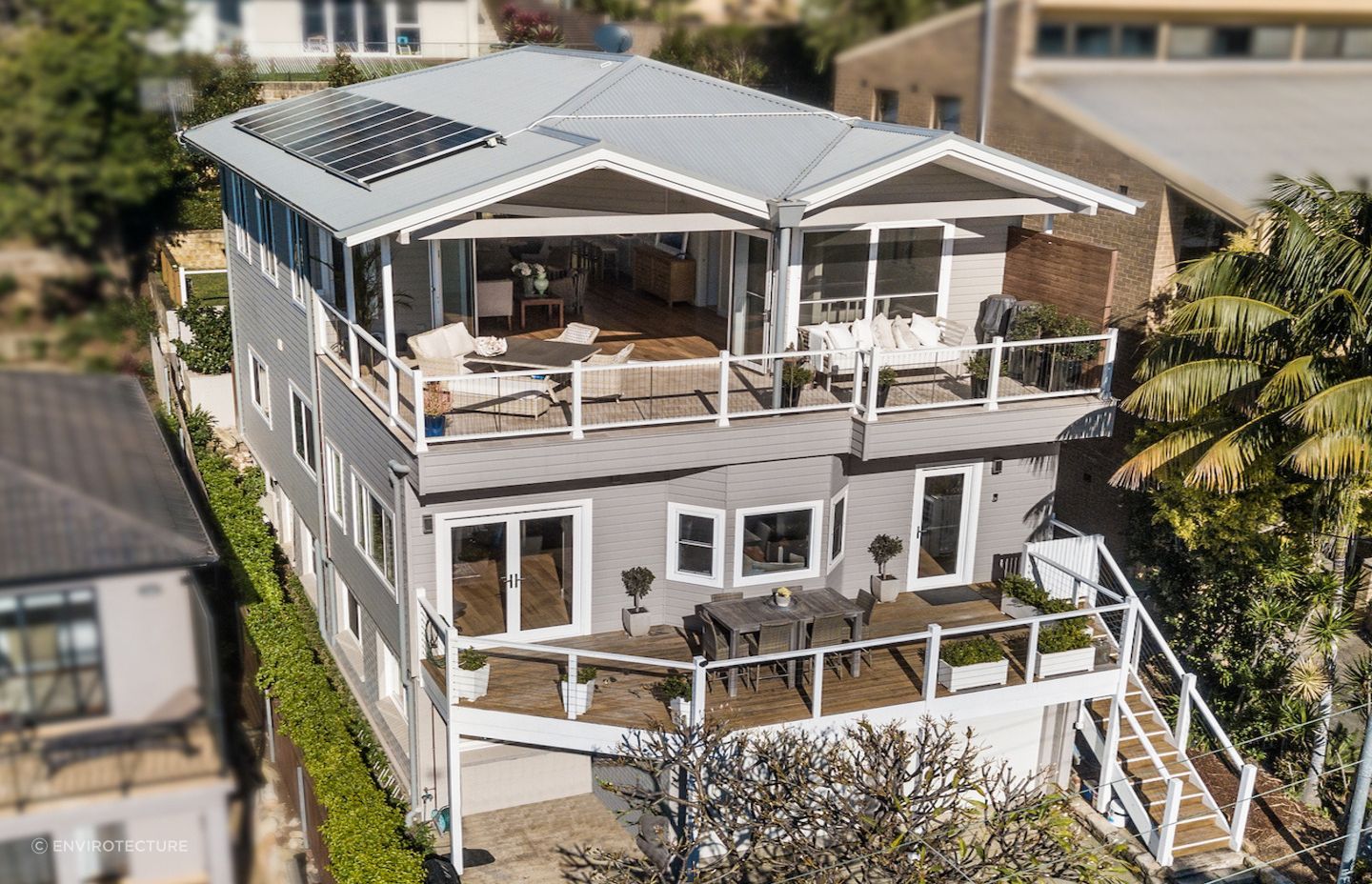 Large open windows and doorways allow fresh air to flow through this stunning home. Photography: Kayle Barton