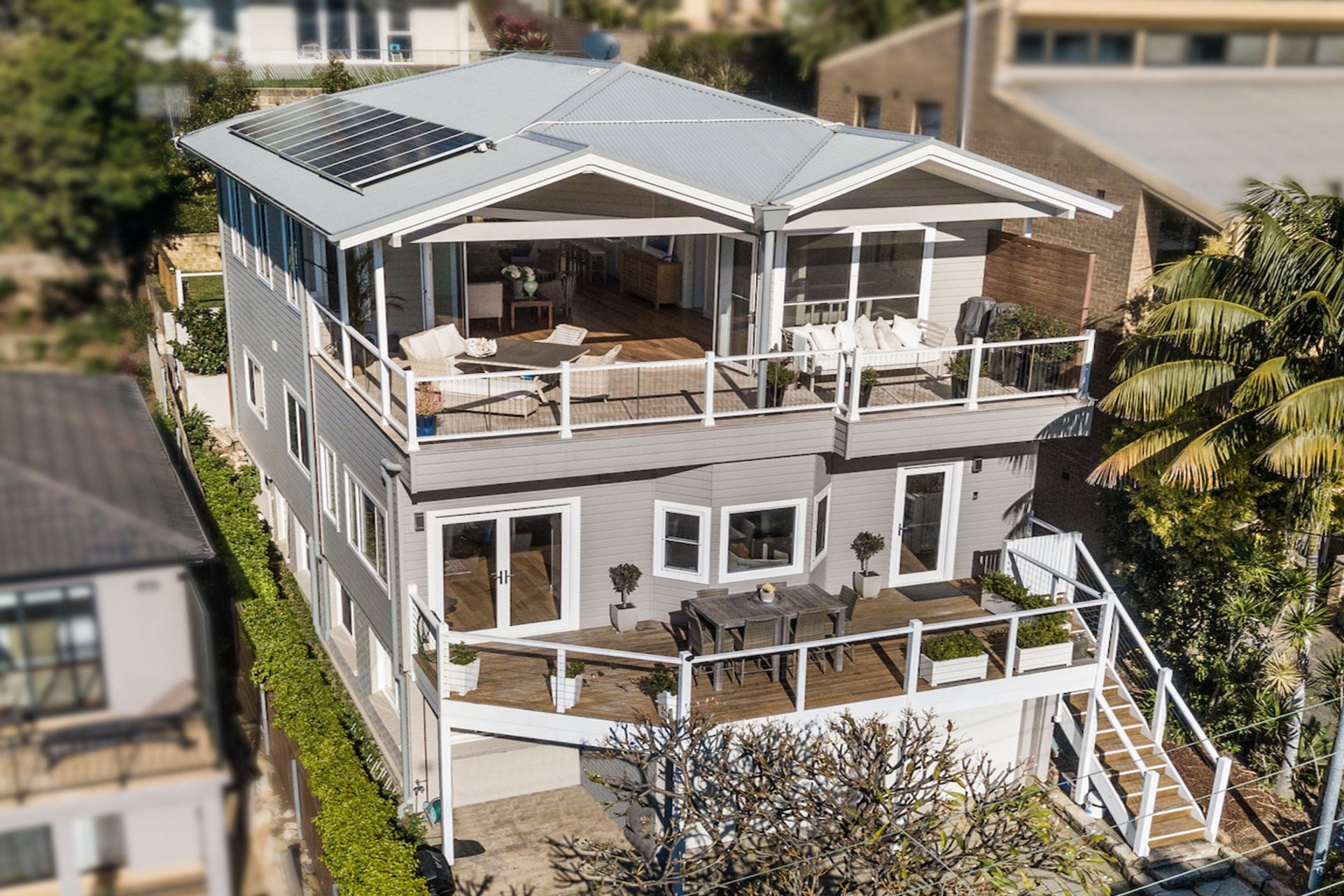 Large open windows and doorways allow fresh air to flow through this stunning home. Photography: Kayle Barton