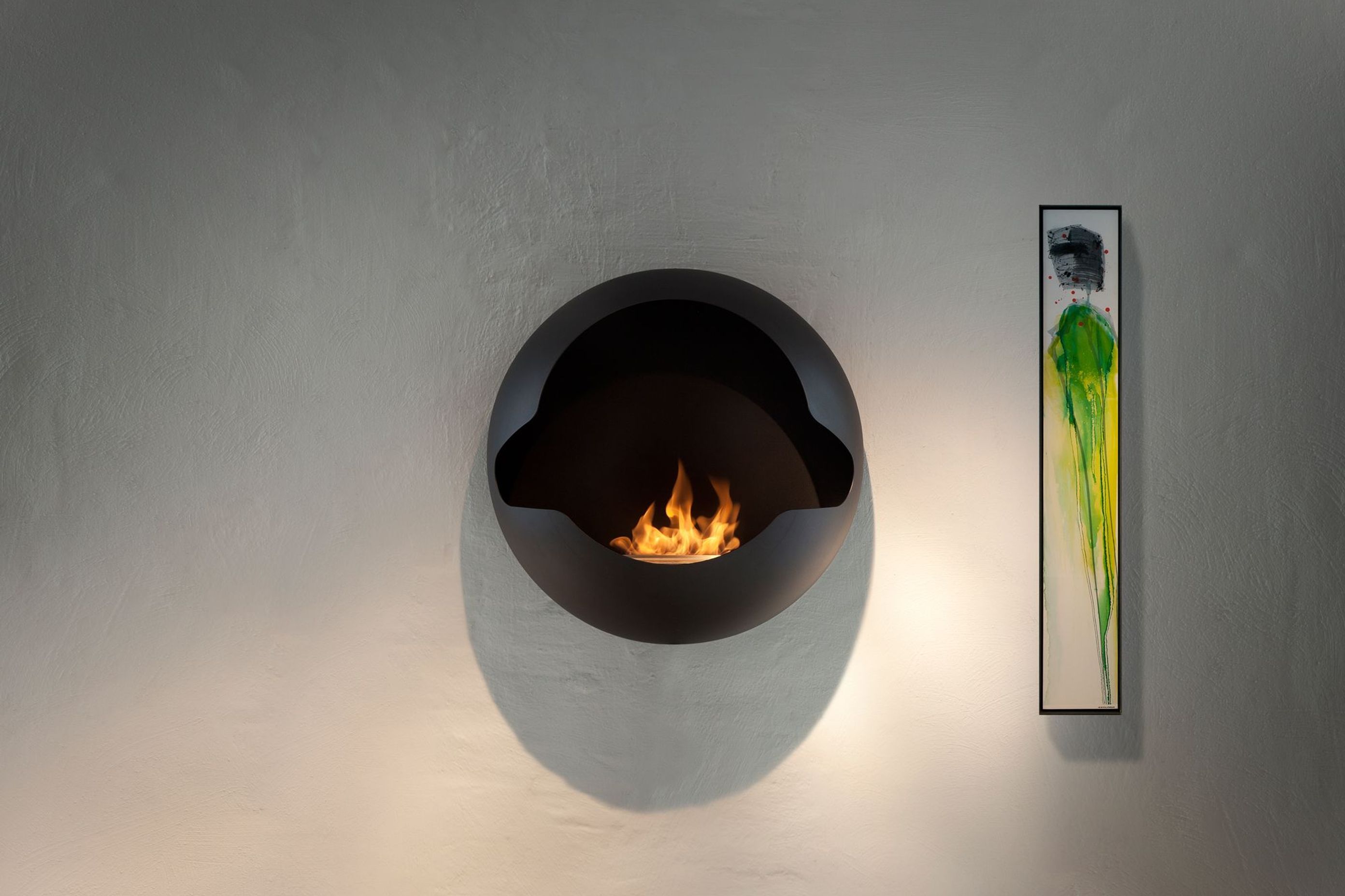 The wall-mounted Vauni Cupola Bioethanol Fireplace shows just how far fireplaces have come in terms of design and features.