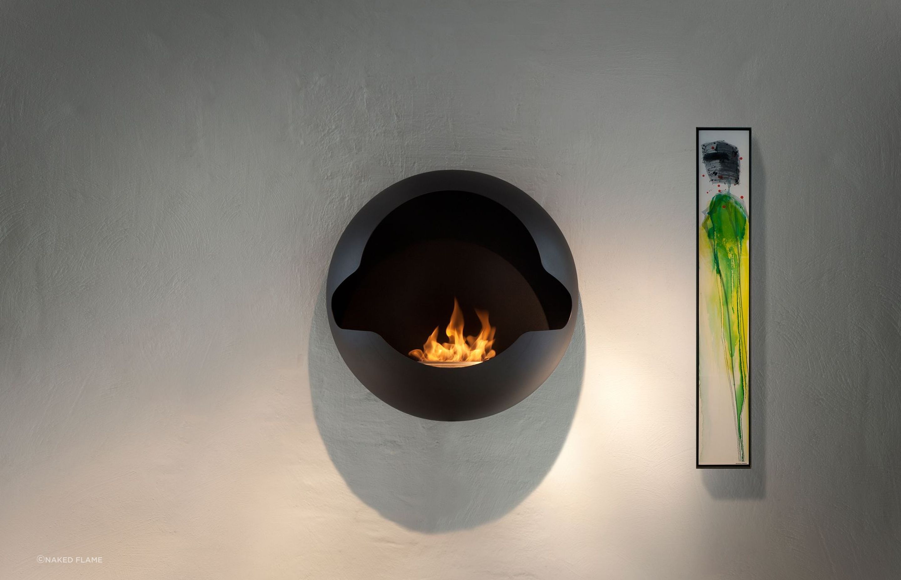 The wall-mounted Vauni Cupola Bioethanol Fireplace shows just how far fireplaces have come in terms of design and features