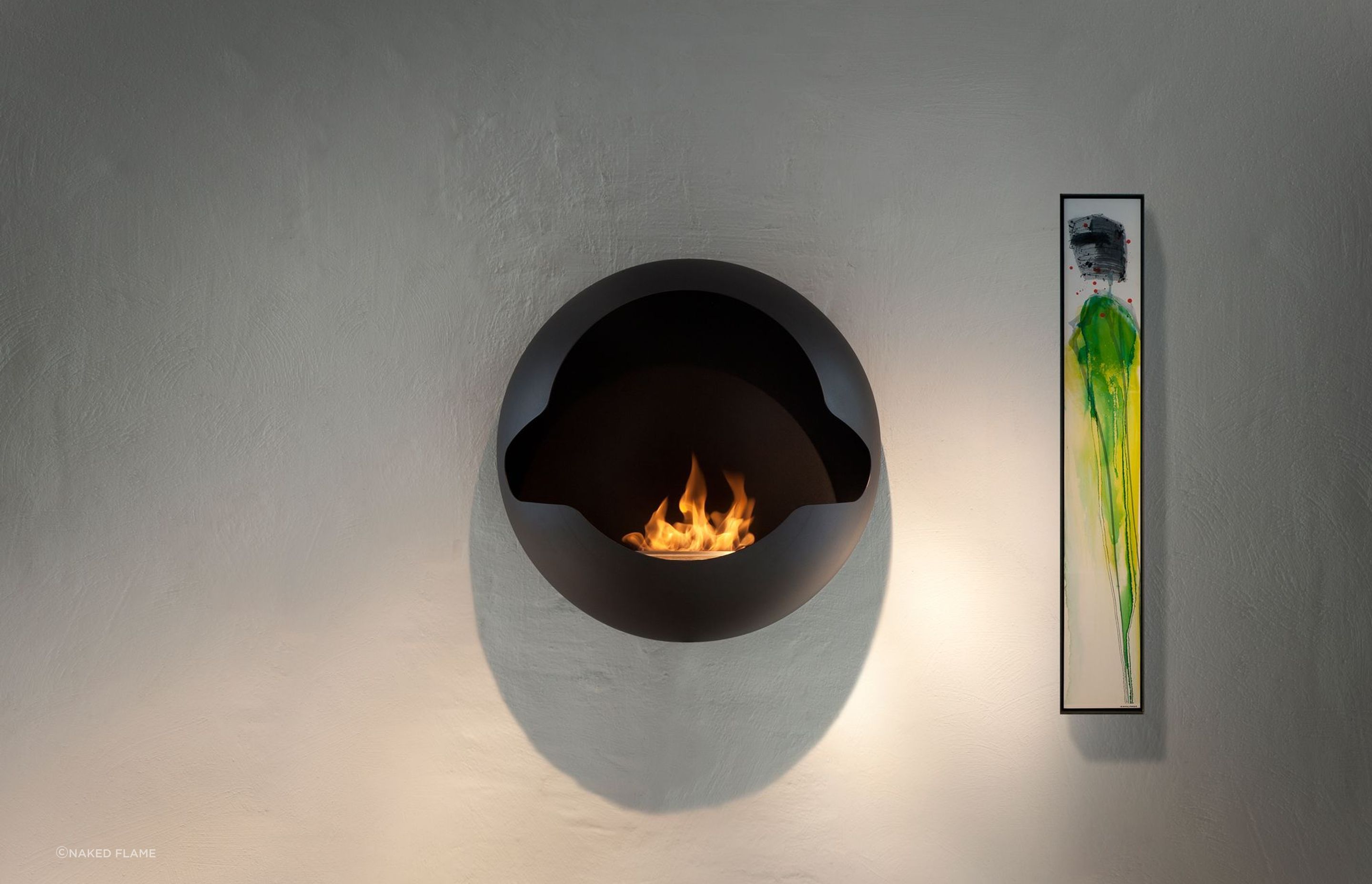 The wall-mounted Vauni Cupola Bioethanol Fireplace shows just how far fireplaces have come in terms of design and features.
