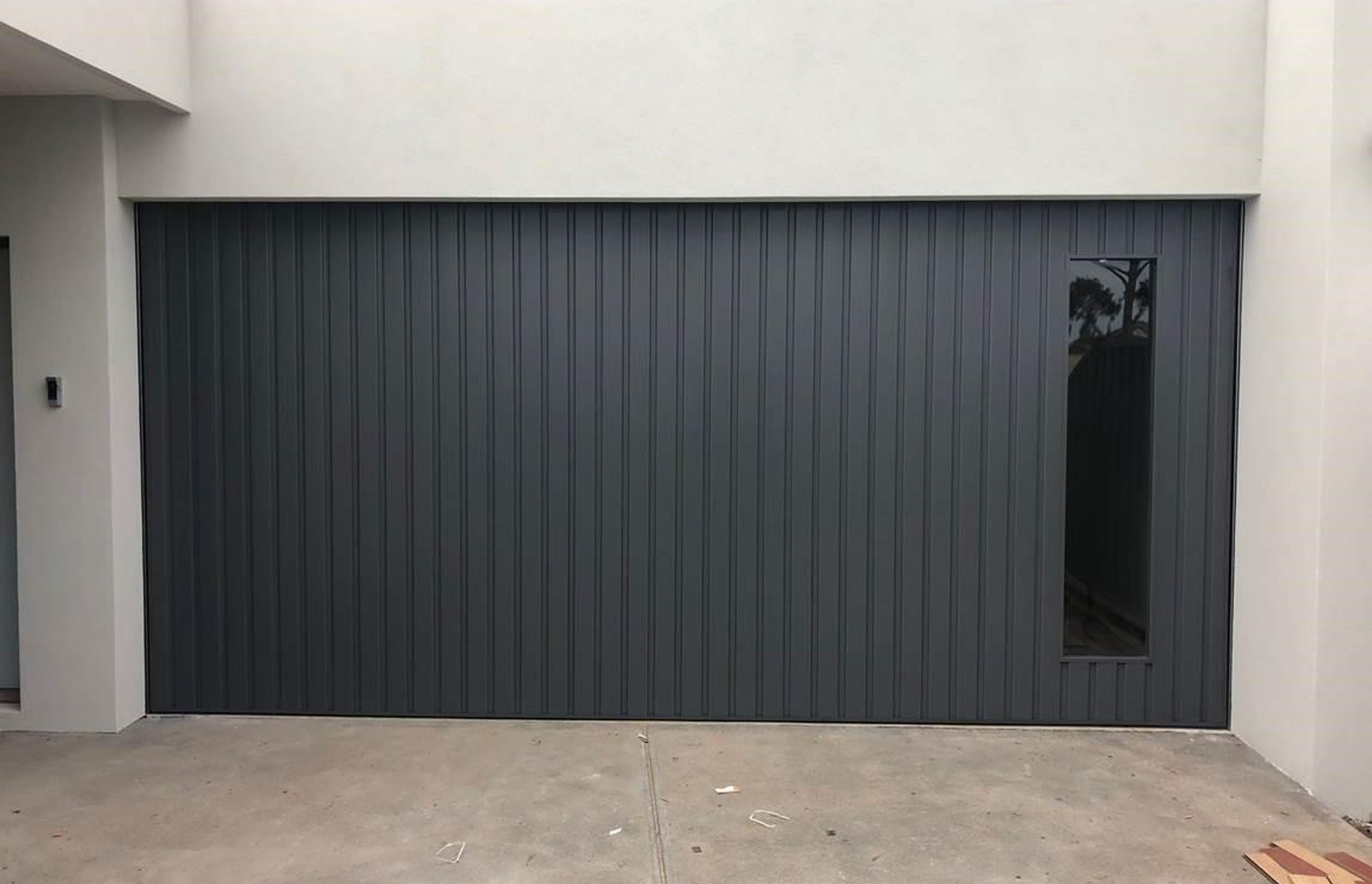 The Pros + Cons of a Tilt Garage Door: Is it Right for You?