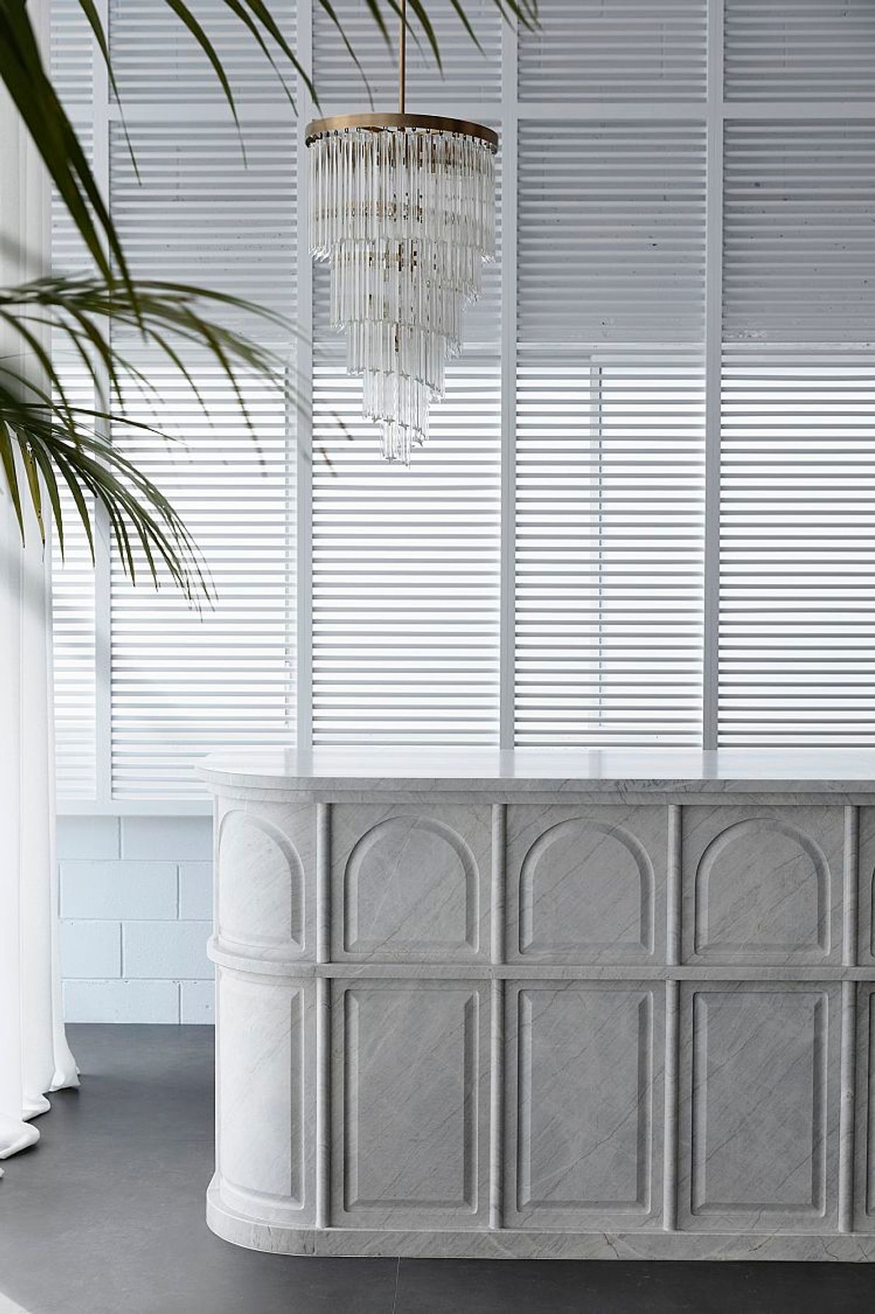 Reception desk crafted from Elba marble