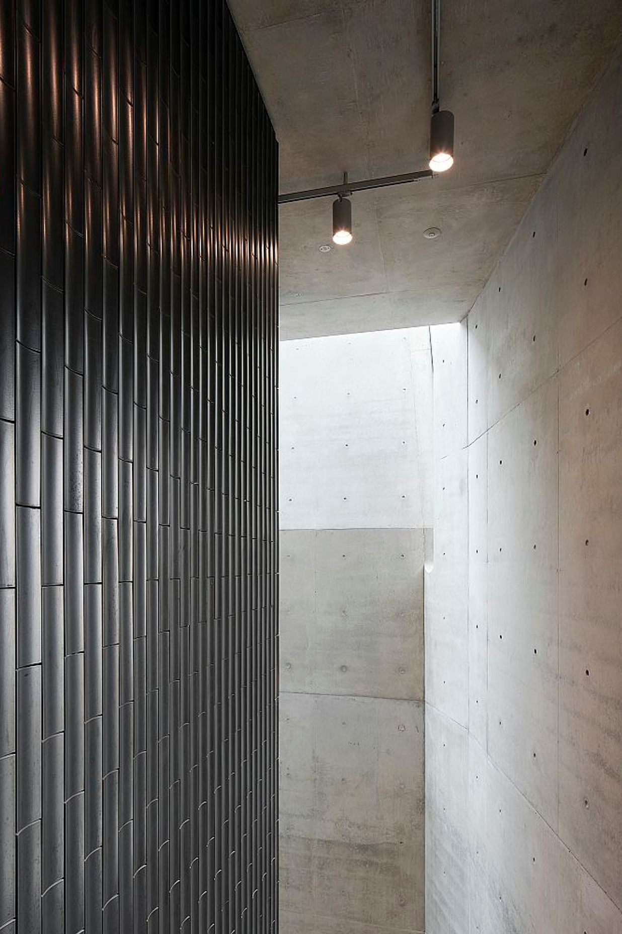 Custom INAX Yumon scalloped tiles. Phoenix Gallery by John Wardle Architects