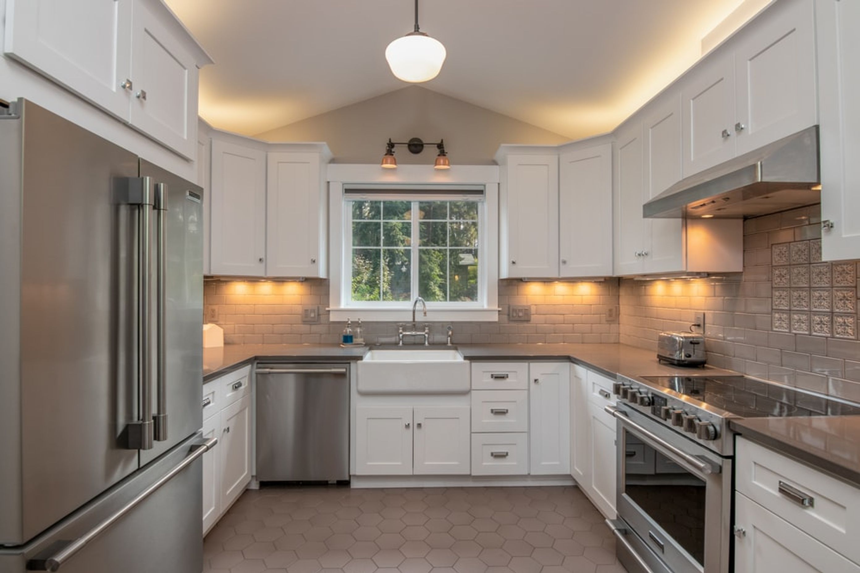 Example of task, ambient and accent lighting in a kitchen | Photo Credit - Unsplash