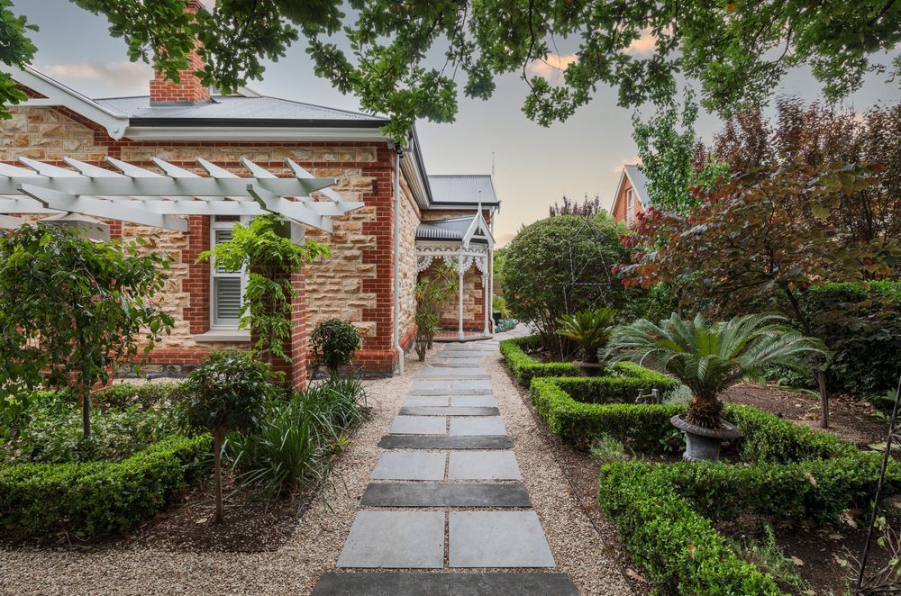 Front yard landscaping design can be centred around pots and plants