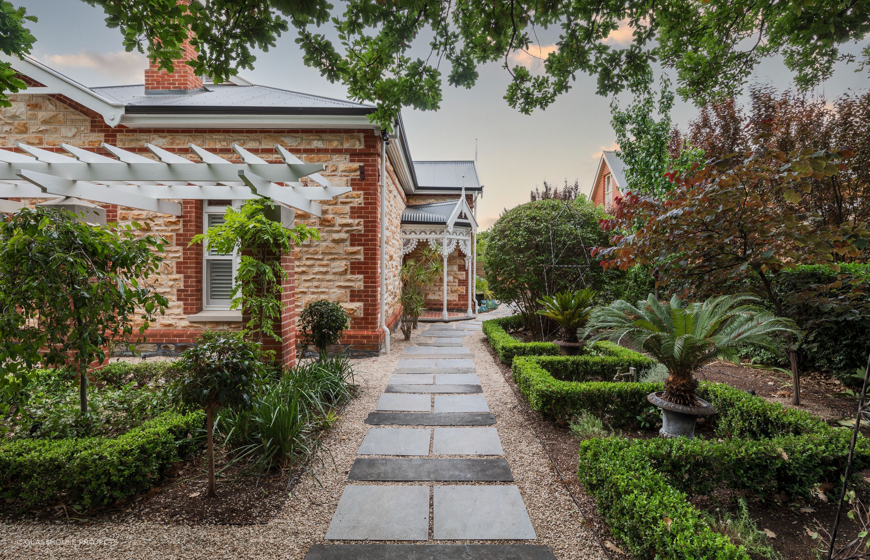 Front yard landscaping design can be centred around pots and plants