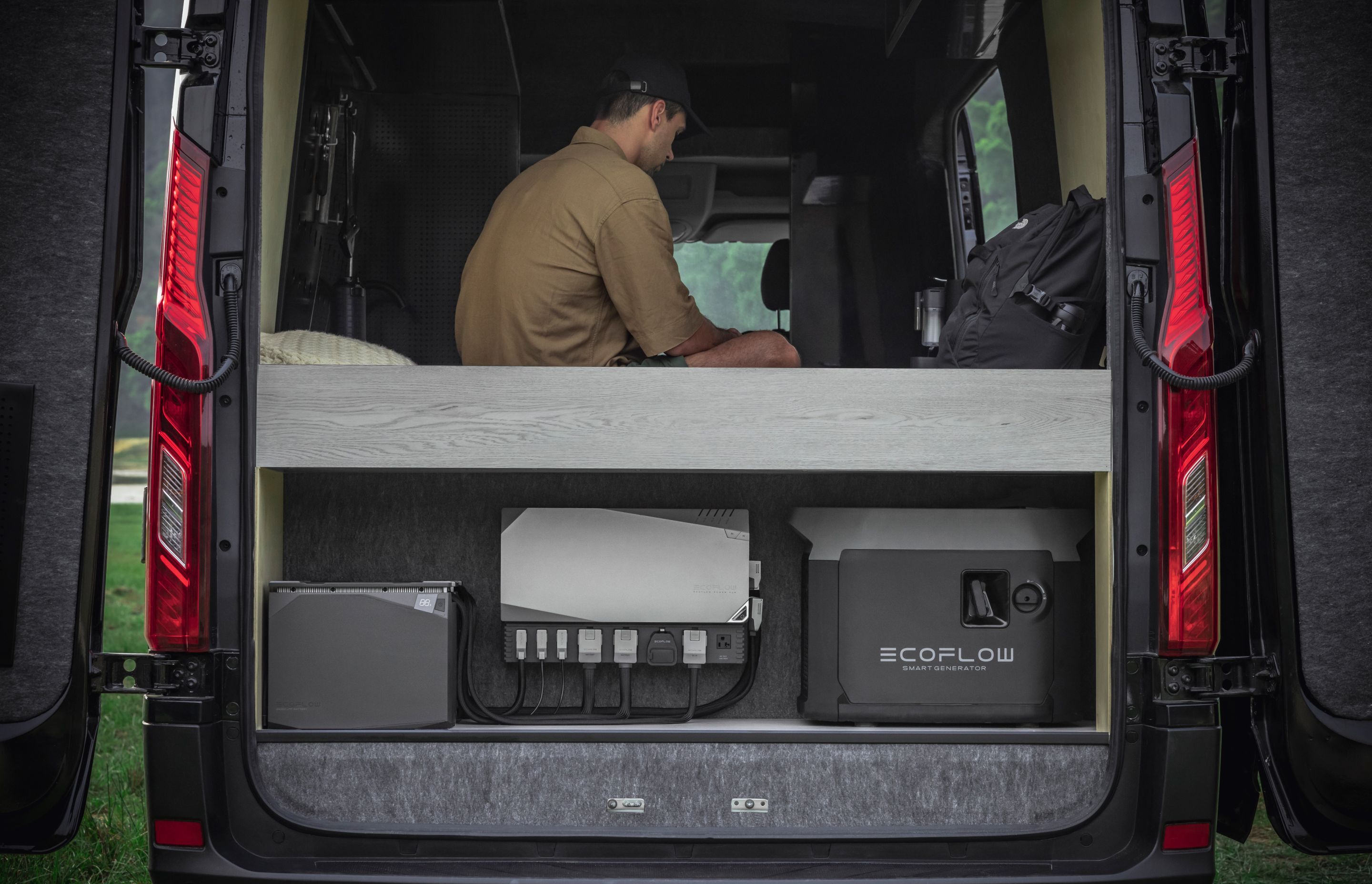 A Power Kit is installed in this converted van with a Smart Generator on hand to provide power on days with limited sunlight.