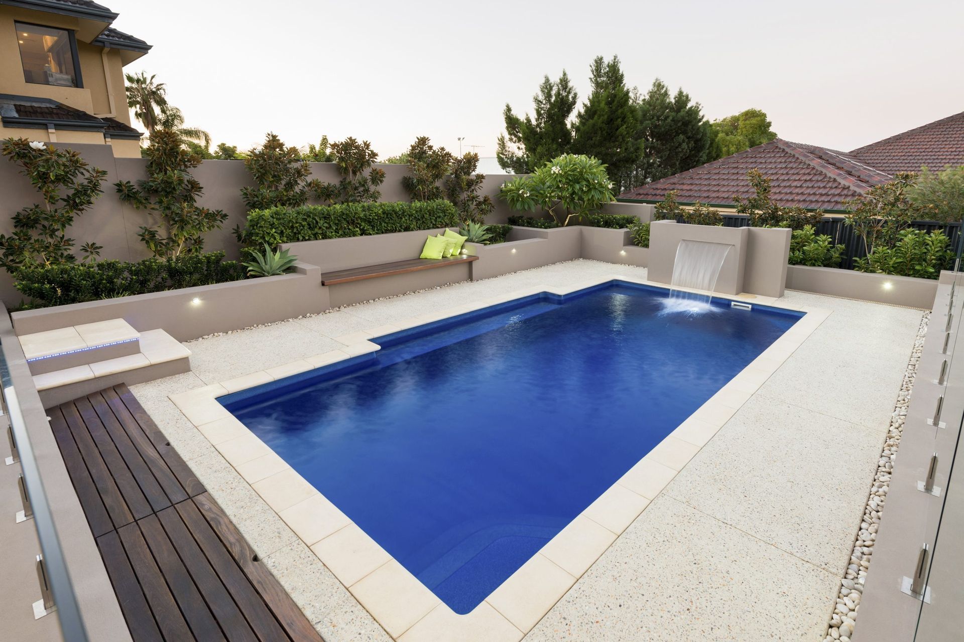 An inground pool with a smooth pool surface