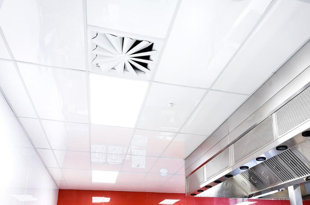 The Fenta Ceiling Tile, an antimicrobial, high-gloss UV coated panel.