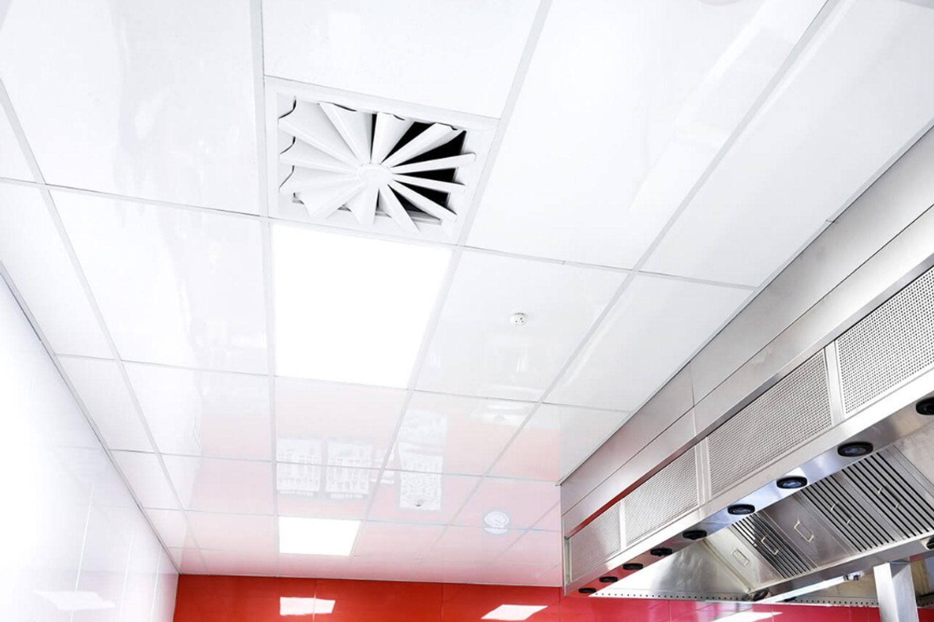 The Fenta Ceiling Tile, an antimicrobial, high-gloss UV coated panel.