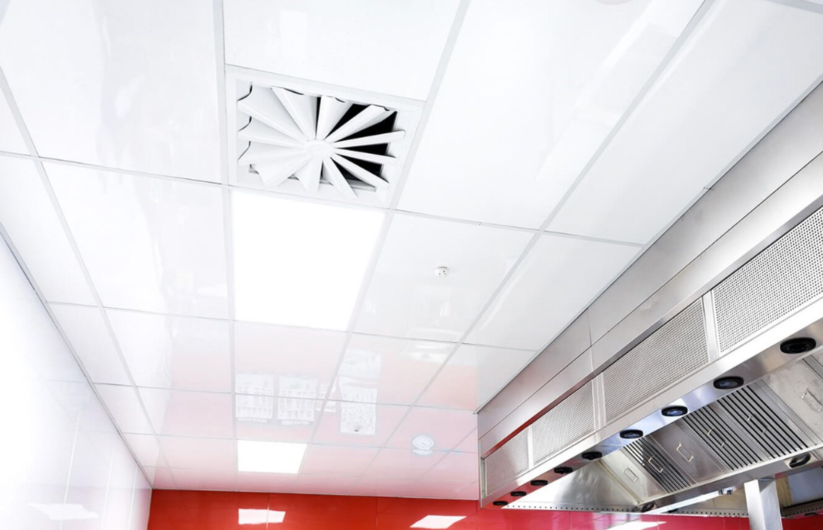 The Fenta Ceiling Tile, an antimicrobial, high-gloss UV coated panel.