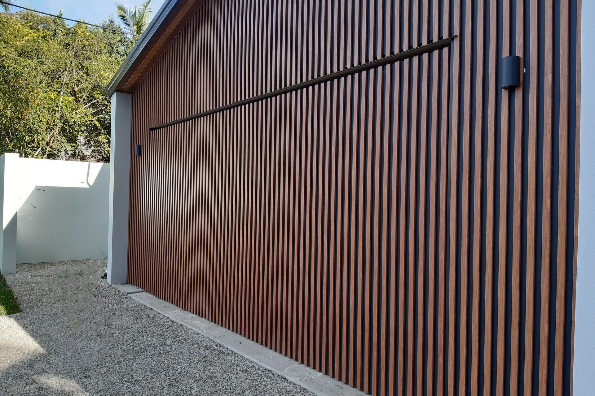 The Pros + Cons of a Tilt Garage Door: Is it Right for You?