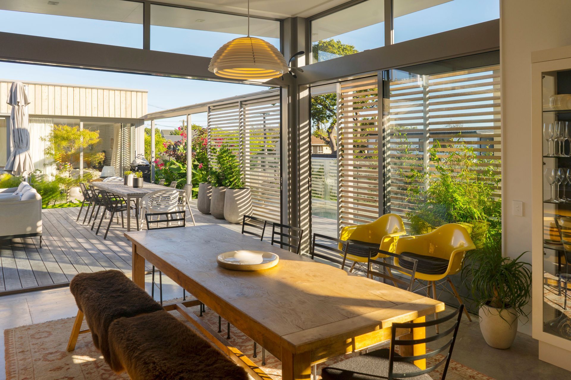 Four Winds. View of dining looking out into courtyard.