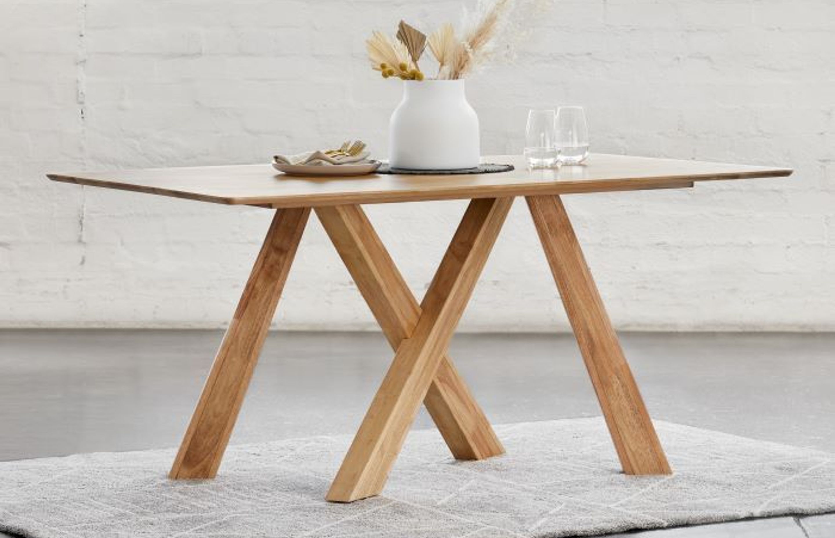 The Gaudi hardwood dining table is crafted with kiln-dried hardwood.