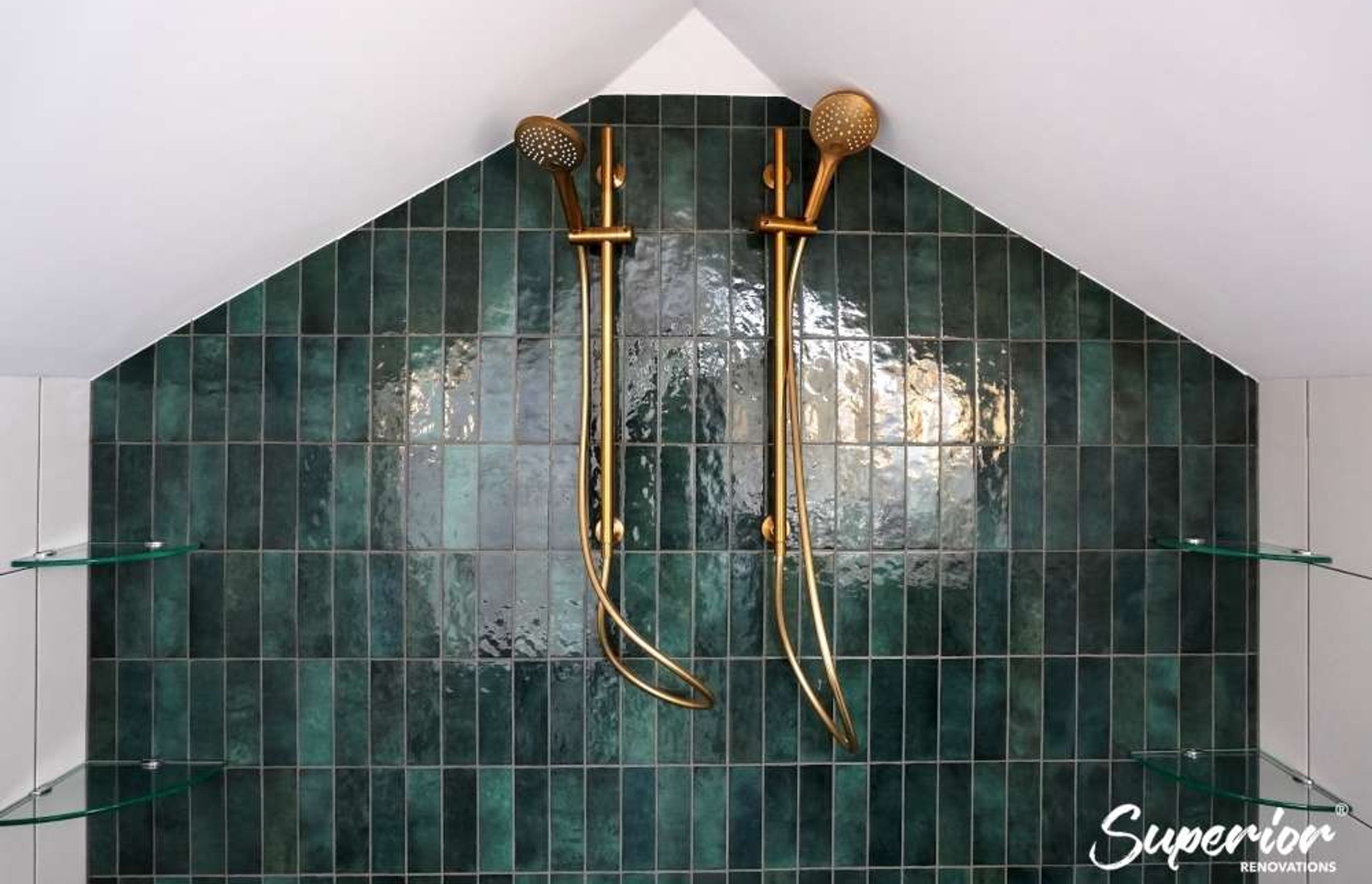 Green Casablana tiles installed in one of the walls of the shower to add some drama in the bathroom (Bathroom renovation in Westmere)
