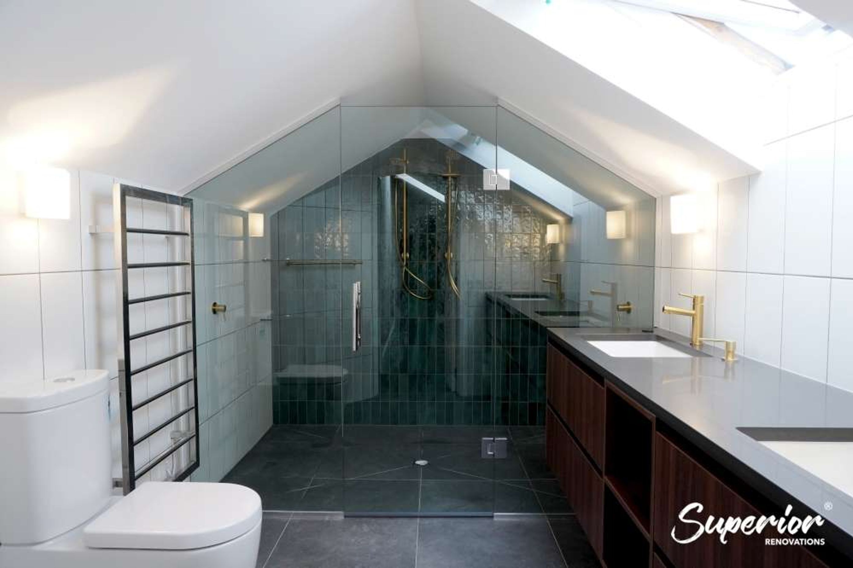 This bathroom was fully renovated in Westmere, Auckland. We created a wet area under the awkward roof area.