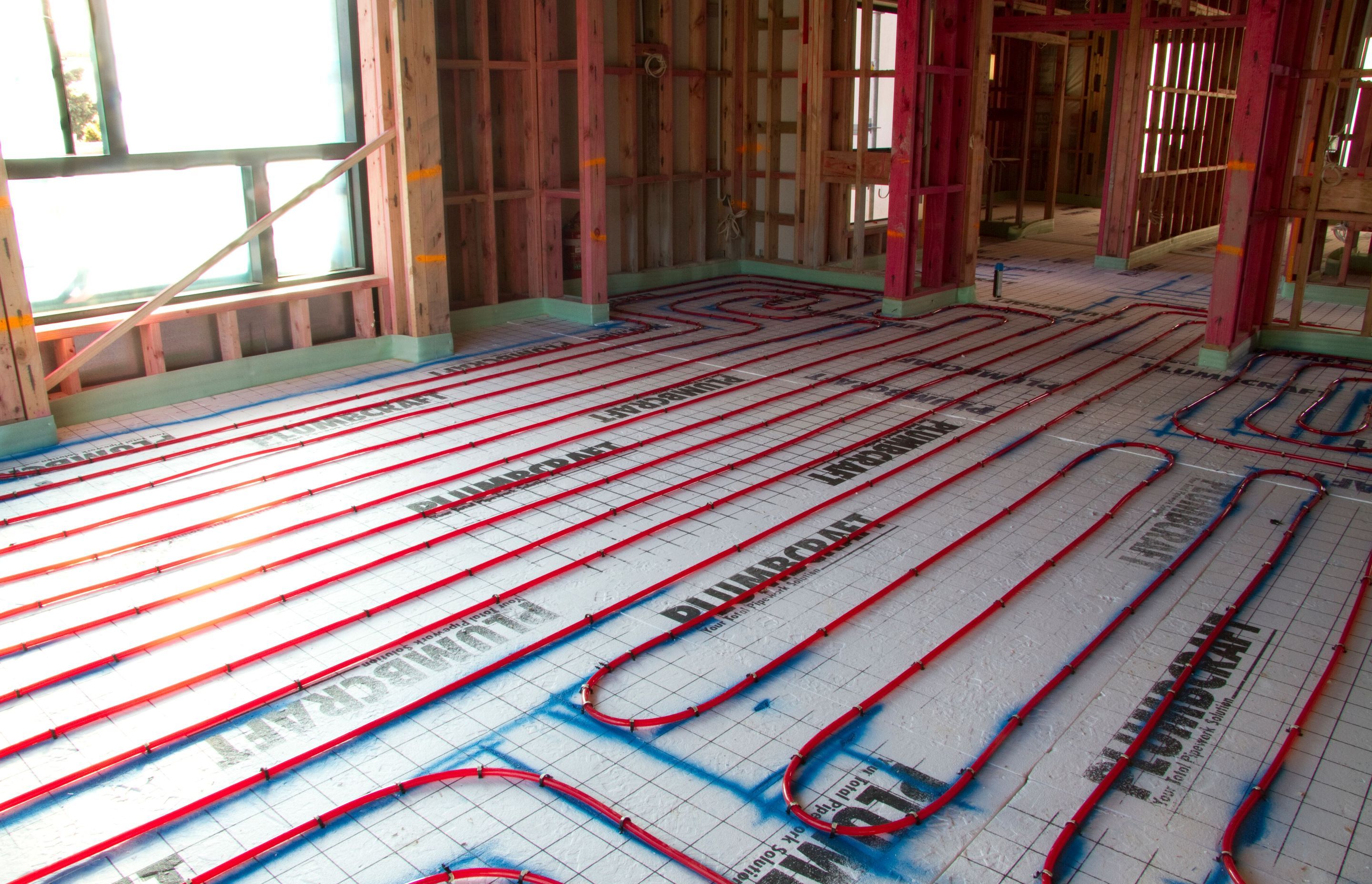 Instead of using radiators to heat a room, Underfloor Heating uses hot water pipes that warm the slab or floor, heating the room from the ground up.