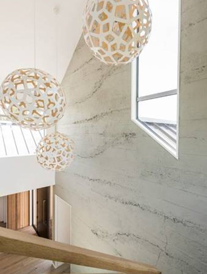 Roughcast concrete wall panels by Muros showcase the subtle rawness of concrete.