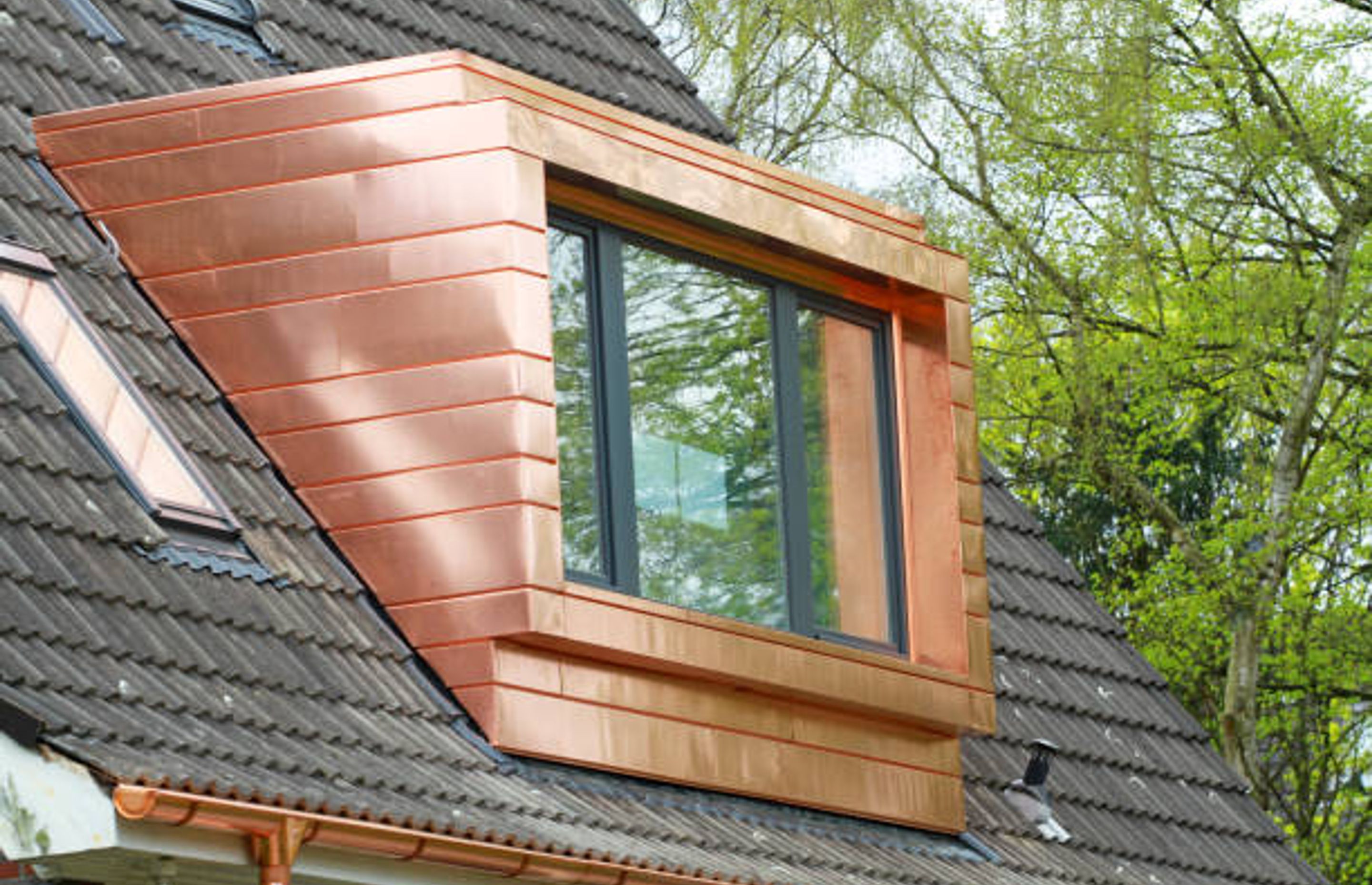 Copper Tiles on a part of the house | Photo Credit – iStock