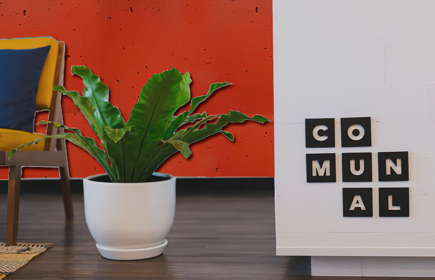 Stonini™ Pitted Concrete panels in ‘lava lava’ add warmth to a communal office space