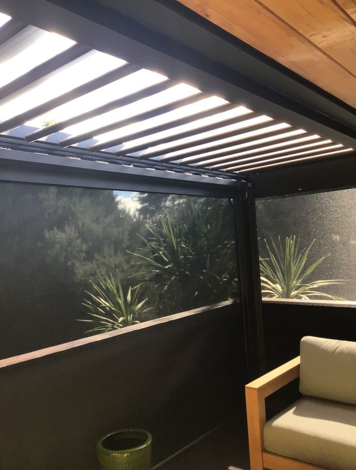 Enclose a balcony – here shown with a louvre roof and Securo outdoor blinds in Techno X fabric.