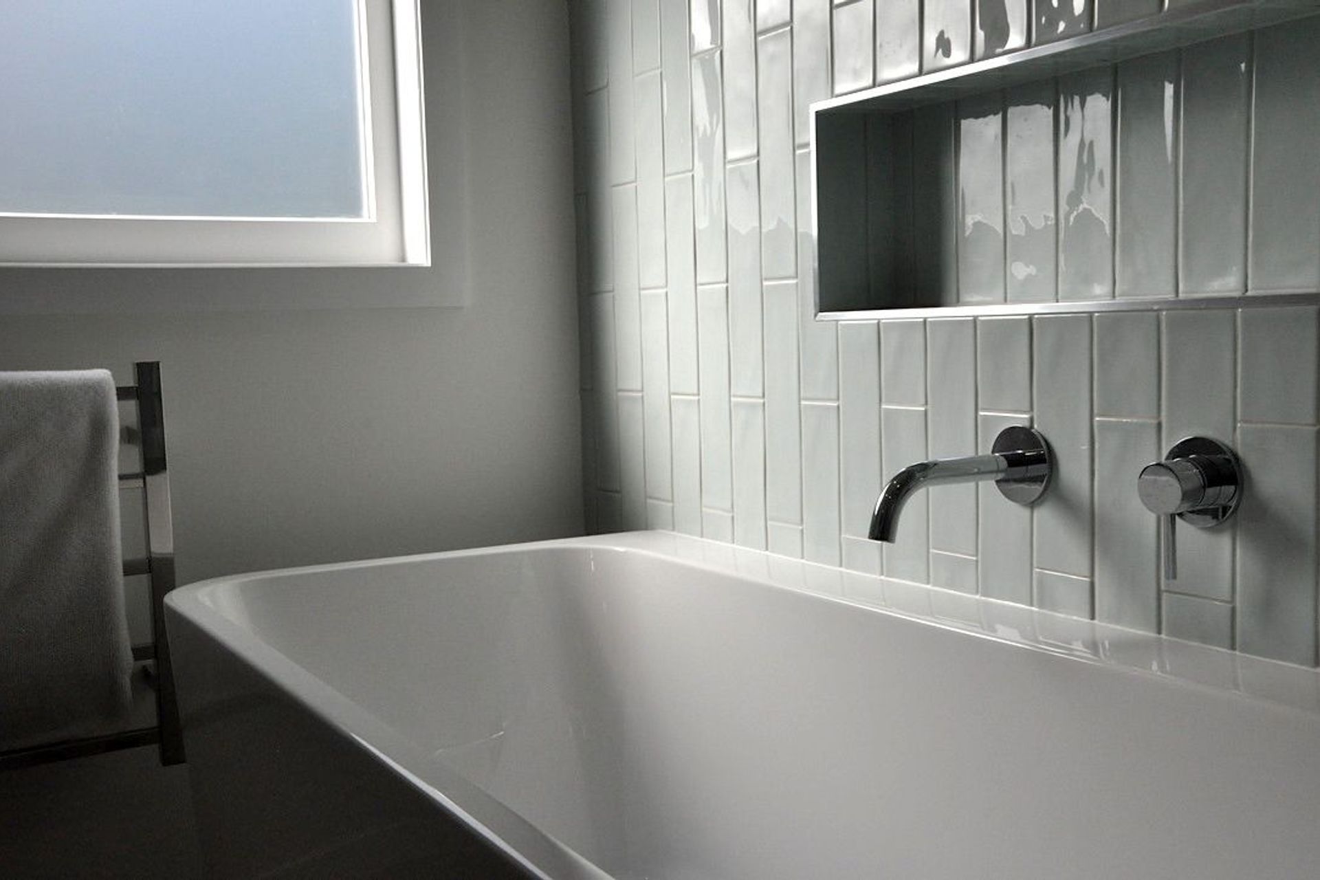 Exquisite use of vertical subway tiles from the Mcintyre Road Project.