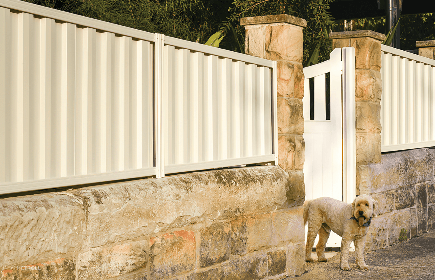 This Metline premium colorbond steel fence provides a stylish entrance to this home.