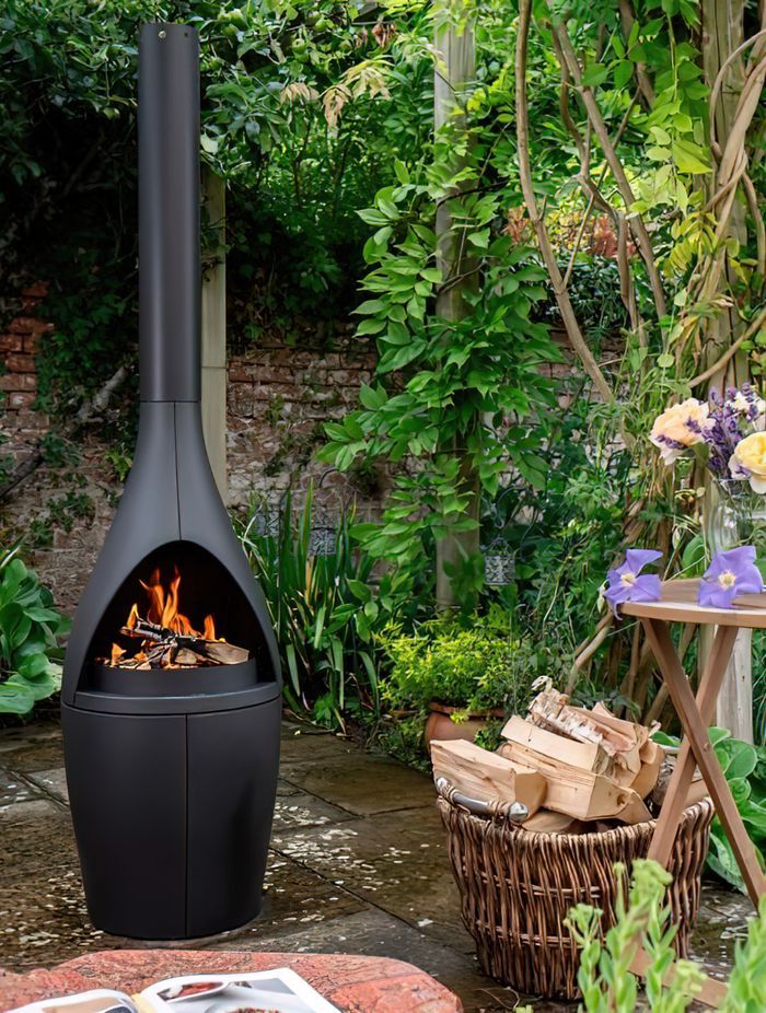 A small outdoor fireplace can still pack a punch in heat output and appearance