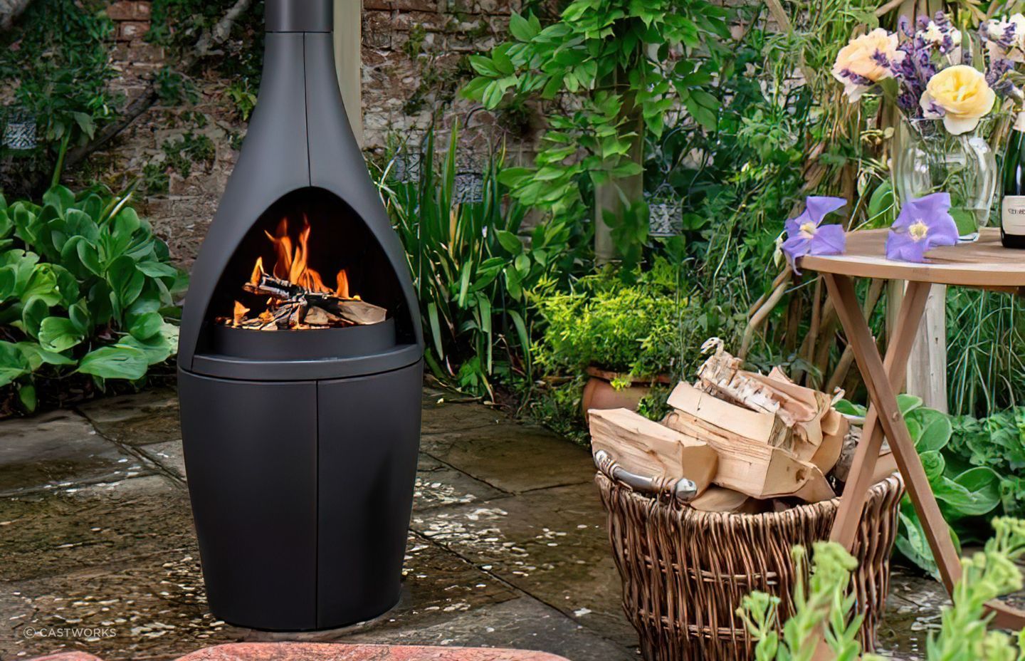 A small outdoor fireplace can still pack a punch in heat output and appearance