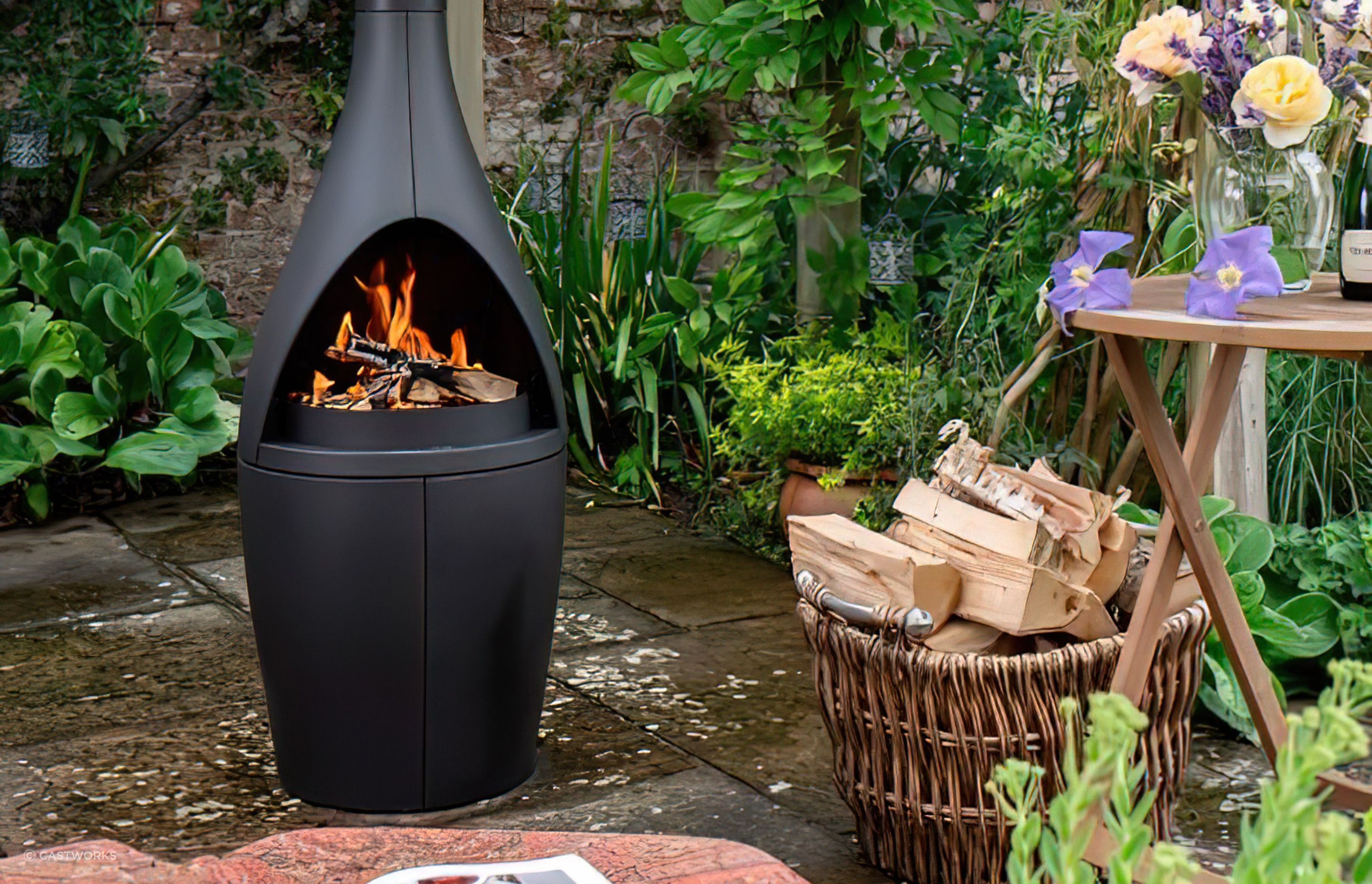 A small outdoor fireplace can still pack a punch in heat output and appearance