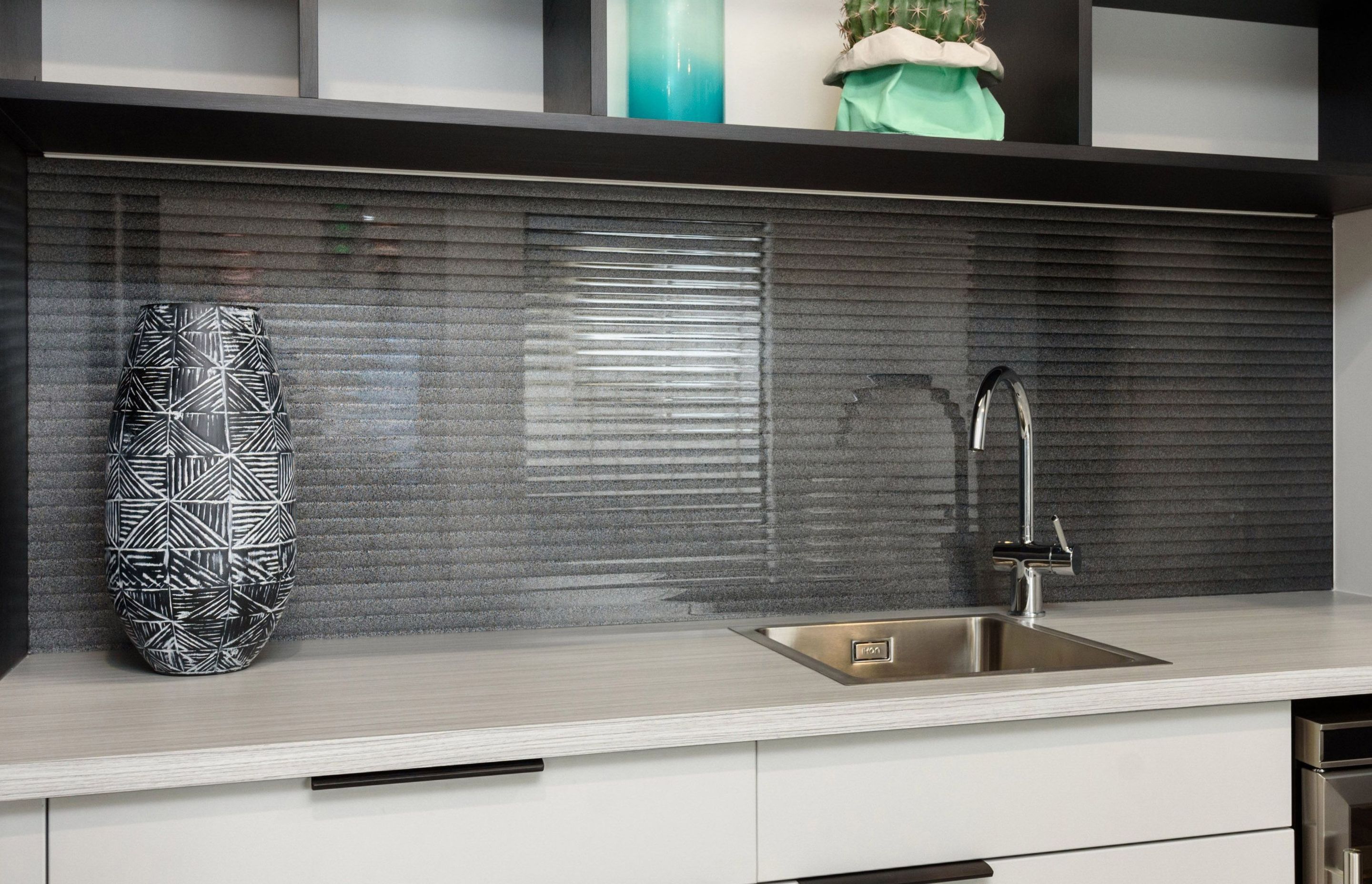 This narrow-reeded glass splashback from Glass Systems is the perfect example of how you can incorporate the feature into your kitchen.
