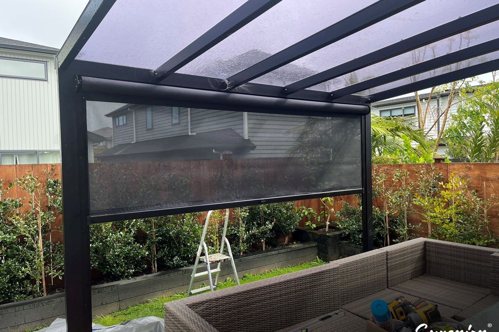 A pergola that acts as a family living space protecting them from outside elements like rain