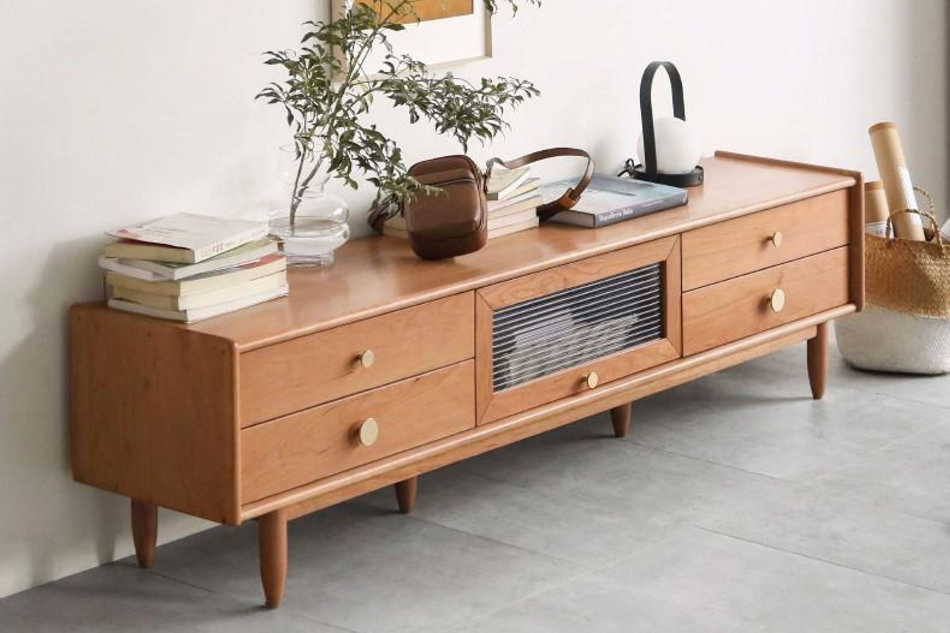 Constructed from 100% solid American cherry hardwood, the Modern TV-Media Stand from Oak Furniture Store is a perfect example of a solid traditional piece anchoring a modern space.