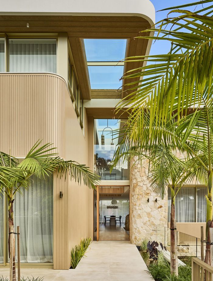 Wanderlust in Vaucluse by Conway & Wise. A coastal sanctuary inspired by Morocco, Santorini, and Los Angeles, featuring Crema Vialle Limestone flowing through the entry, balconies, and outdoor spaces. One of 2025's standout residential projects.