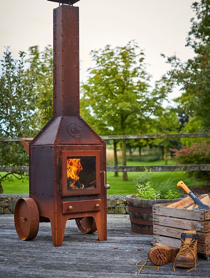 Say goodbye to the BBQ and hello to a dual-function outdoor fireplace - perfect for heating and cooking