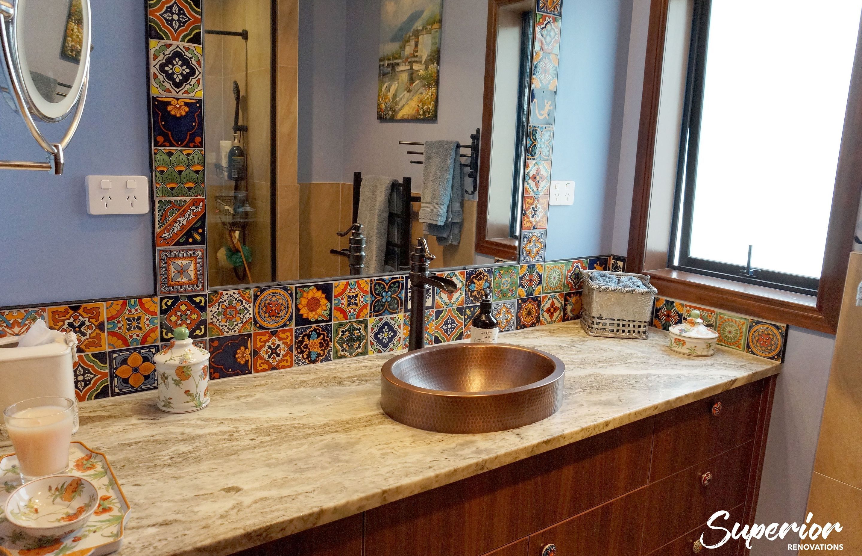 Mary Stuart’s Spanish style bathroom in Stanmore Bay features blue painted walls and colourful mosaic tiles to add a ‘pop’ of colour to her bathroom