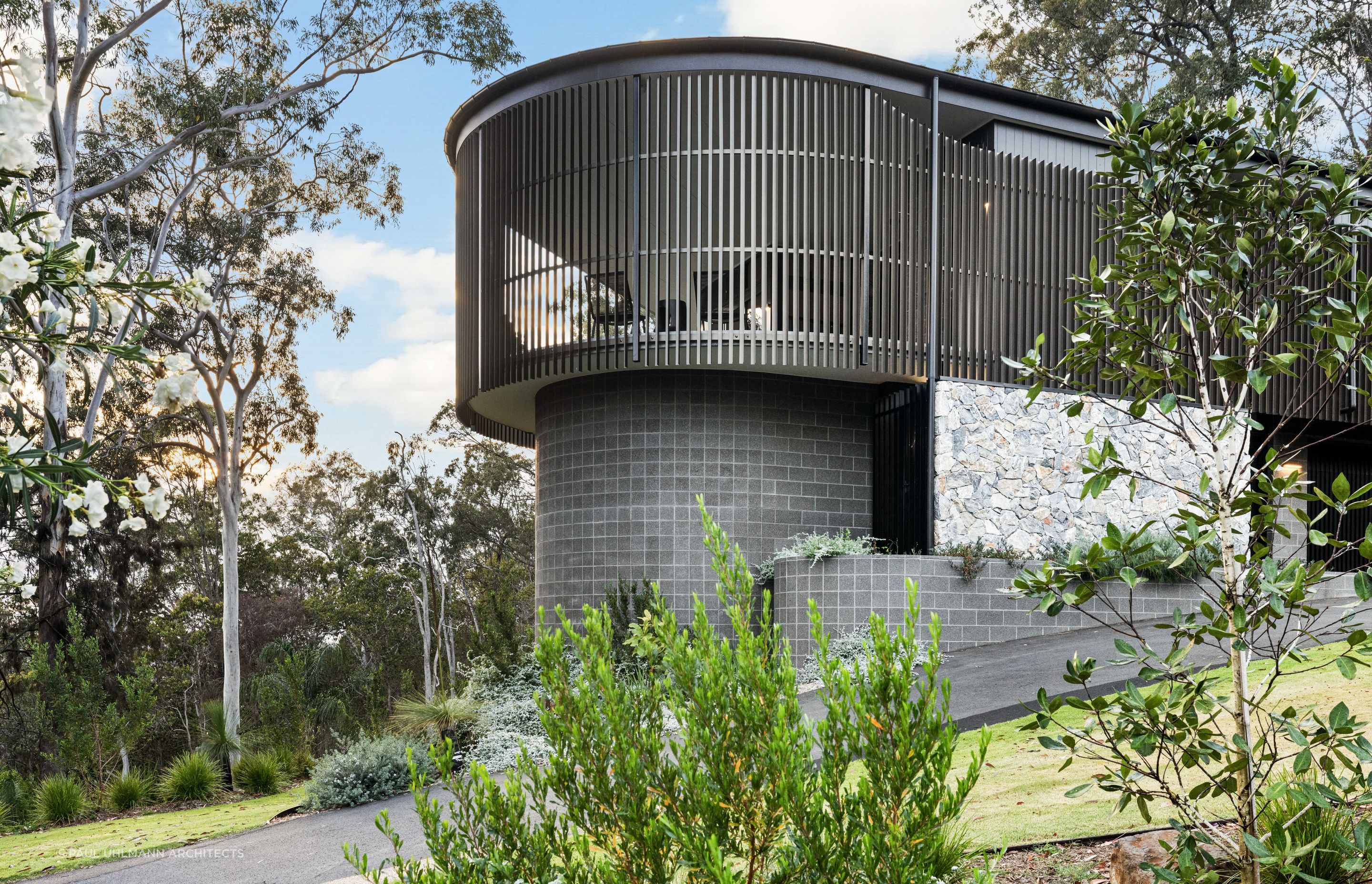 There are plenty of stunning facades that integrate different materials, such as natural stone cladding and forms of metal cladding.