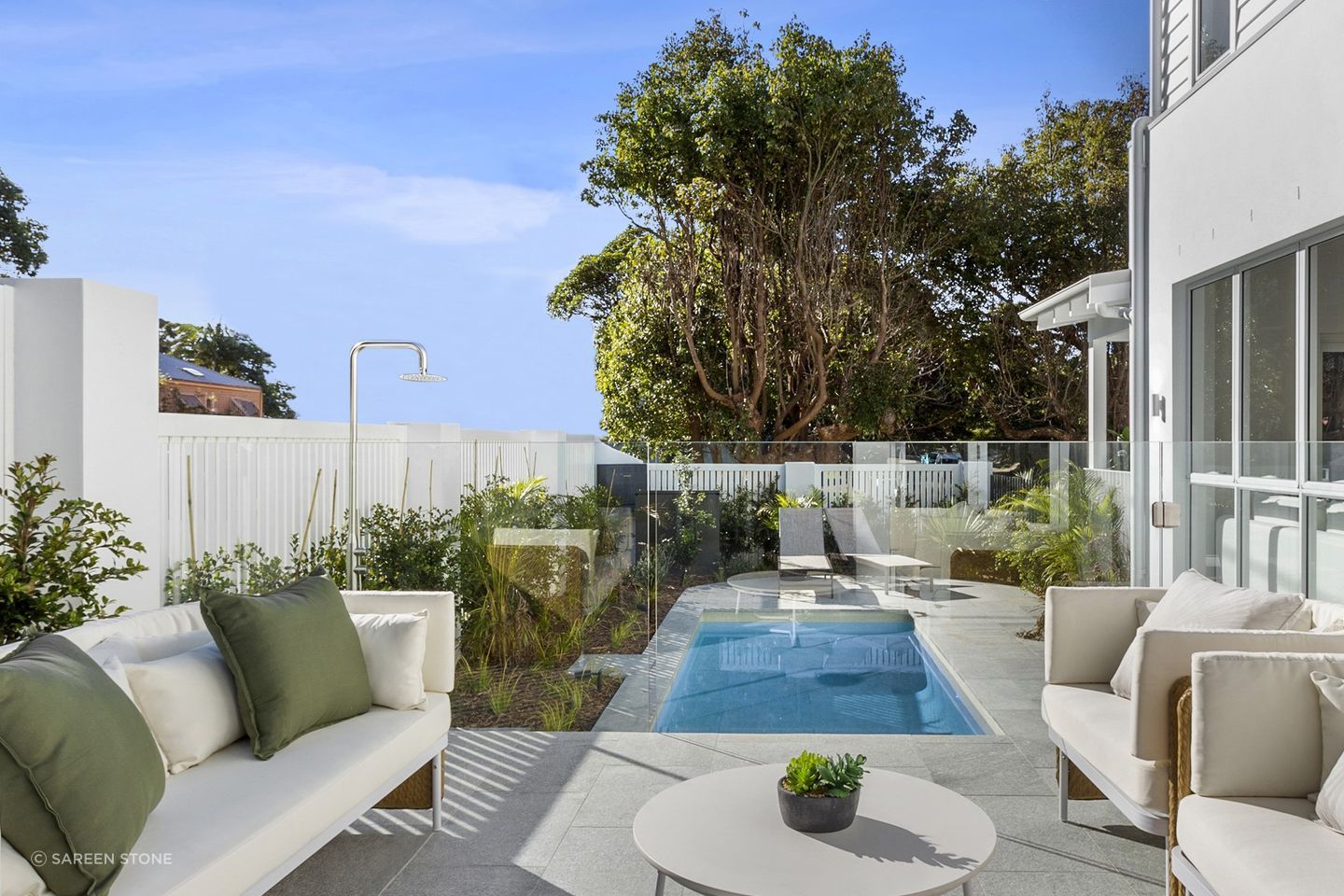 Granite's natural colour complements beige or cream sofas effortlessly.