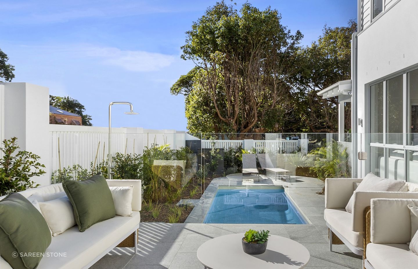Granite's natural colour complements beige or cream sofas effortlessly.