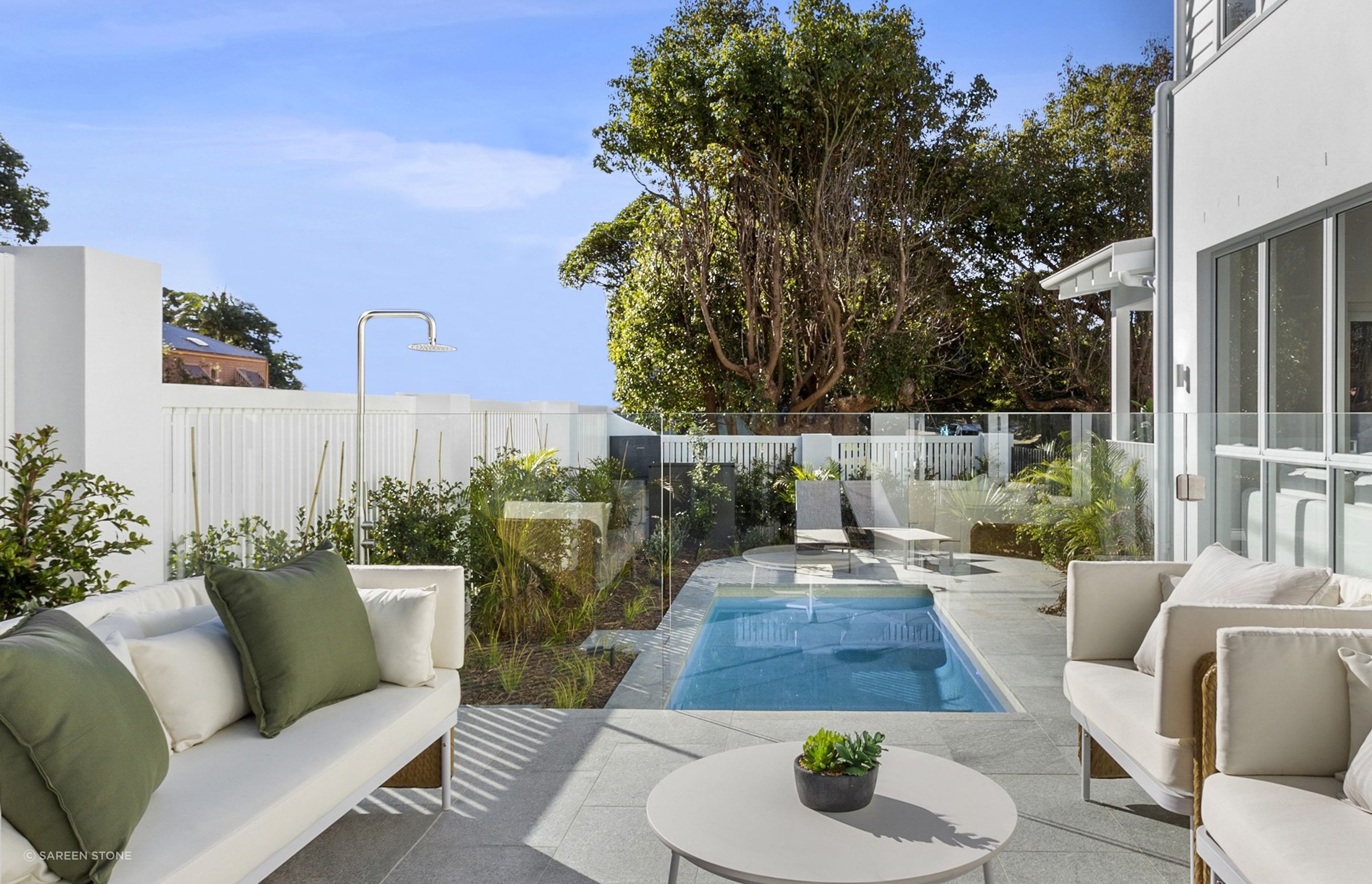 Granite's natural colour complements beige or cream sofas effortlessly.