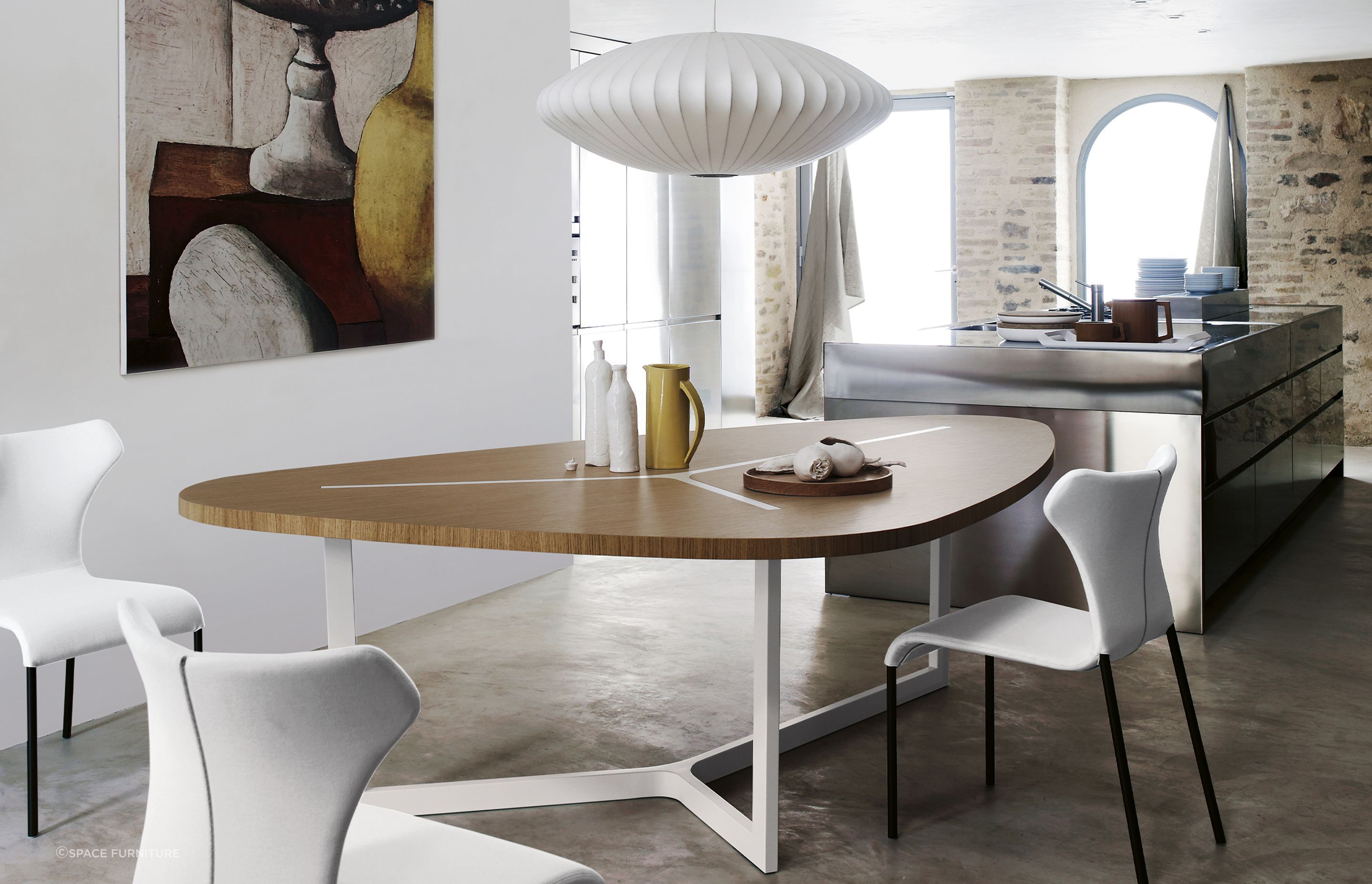 Serveware features on the Seven Table Dining Table from Space Furniture