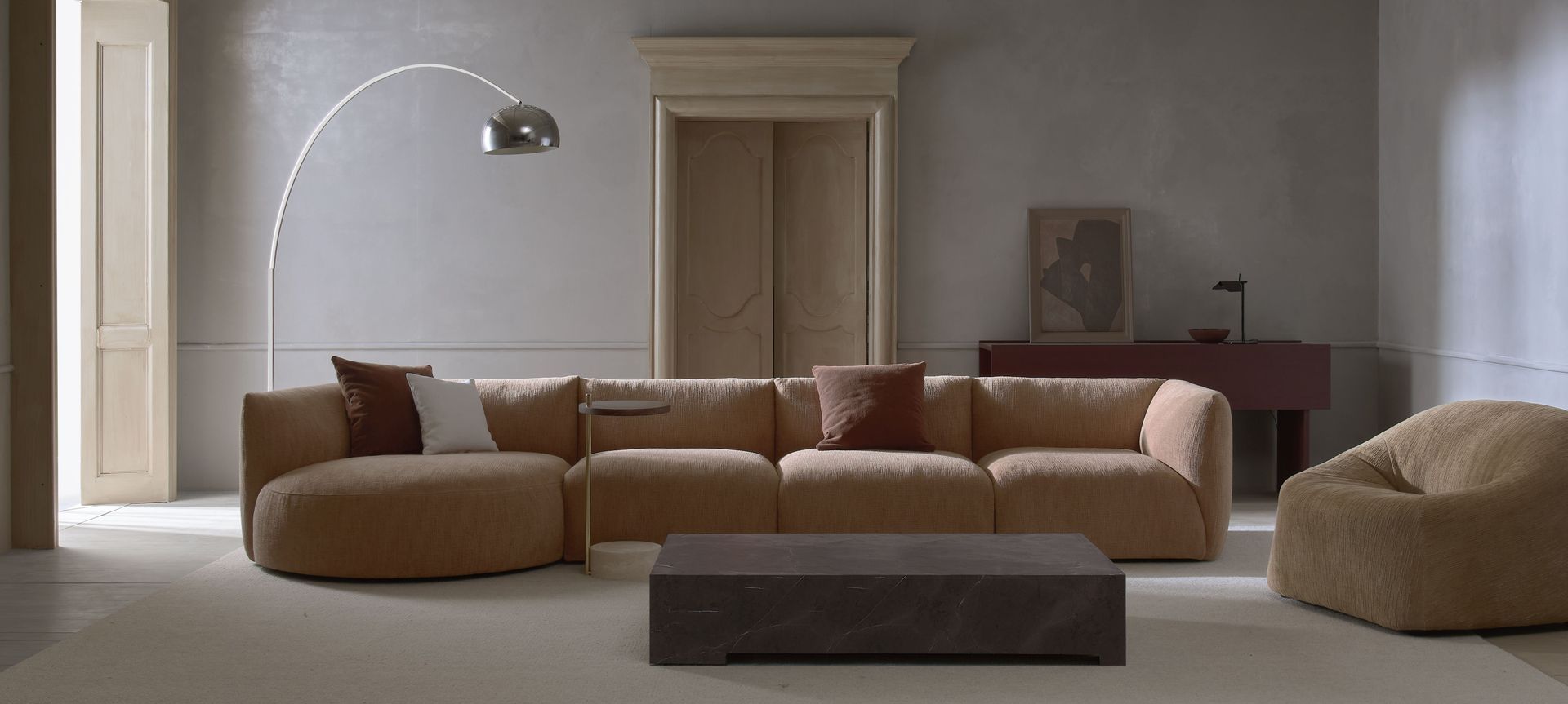 Slipper sofa, Alchemy coffee table, Arbor lounge chair and Society side table for Natadora